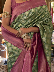 Breathtaking Green Zari Woven Kanjivaram Silk Reception Wear Saree