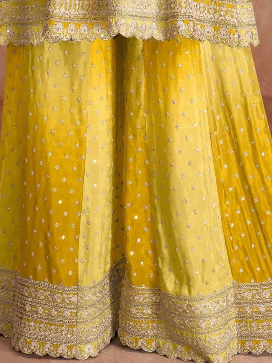 Yellow designer lehenga with gold embroidery and scalloped hem, ethnic Indian wear
