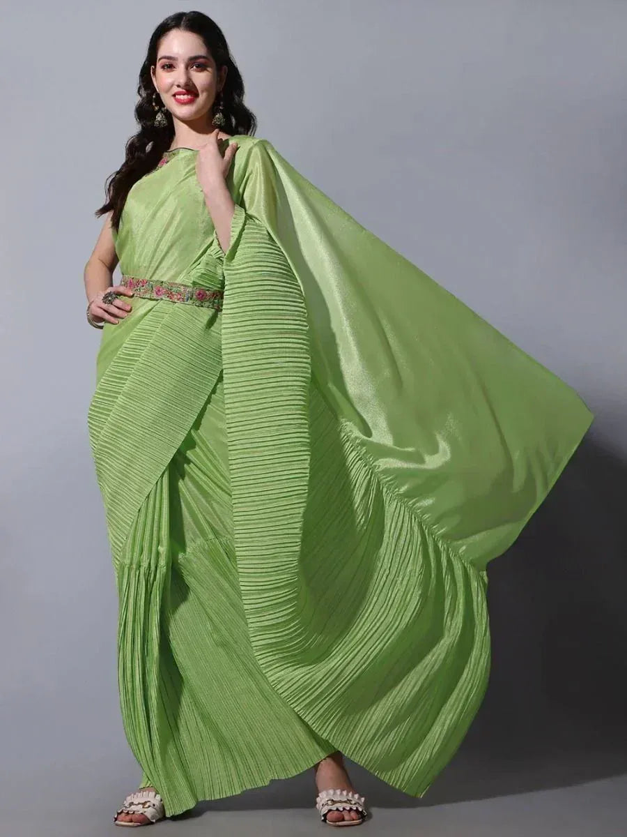 Lime green pleated saree with floral belt, elegant ethnic wear for women