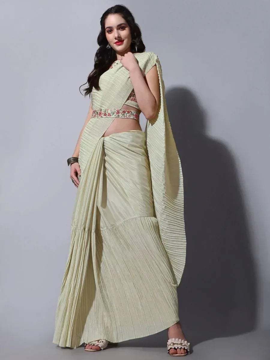 Light green pleated saree with floral border, stylish ethnic wear for women