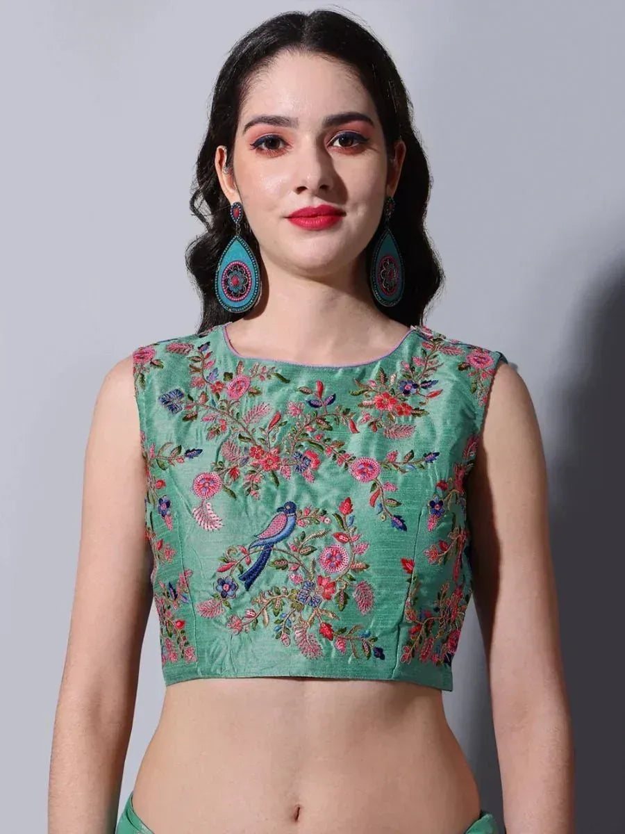 Green embroidered crop top with floral and bird design, perfect for ethnic wear