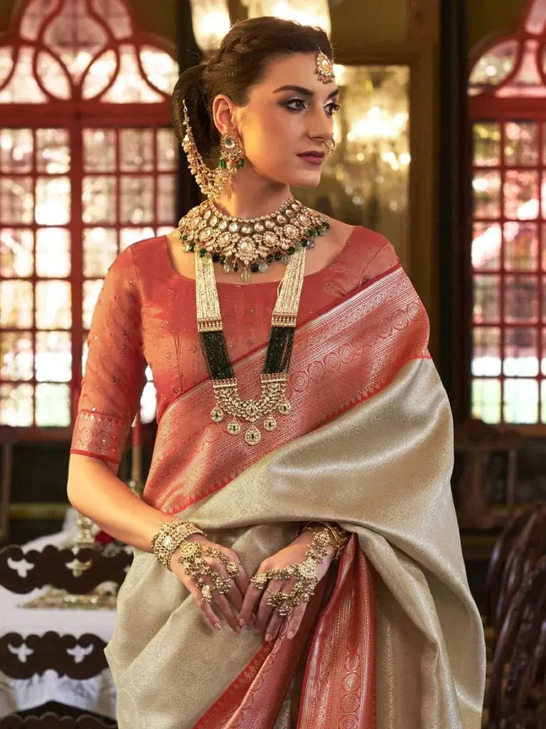 Astonishing Cream Heavy Weaving Kanjivaram Silk Wedding Wear Saree