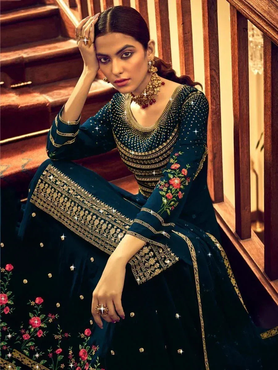Elegant dark green embroidered salwar kameez with floral motifs and gold detailing, perfect for Indian ethnic occasions.