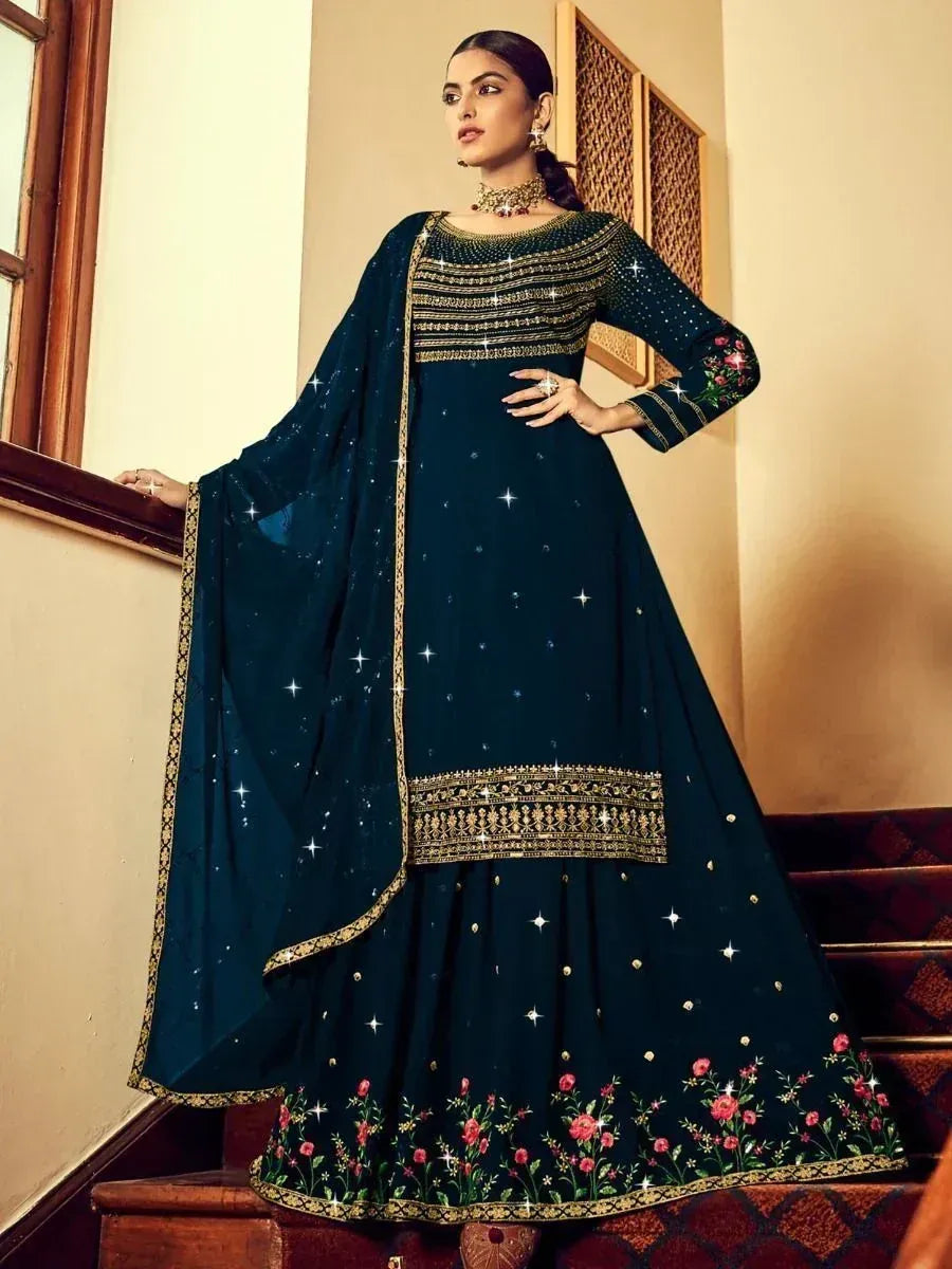 Elegant dark green anarkali with gold embroidery and floral hem, paired with matching dupatta for festive occasions