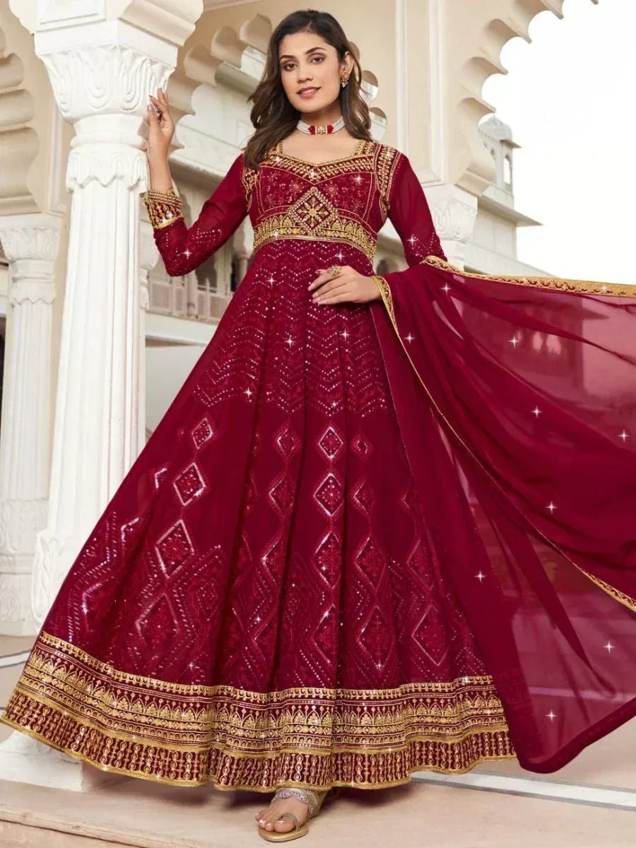 Maroon designer anarkali with gold embroidery, perfect for Indian ethnic occasions and weddings