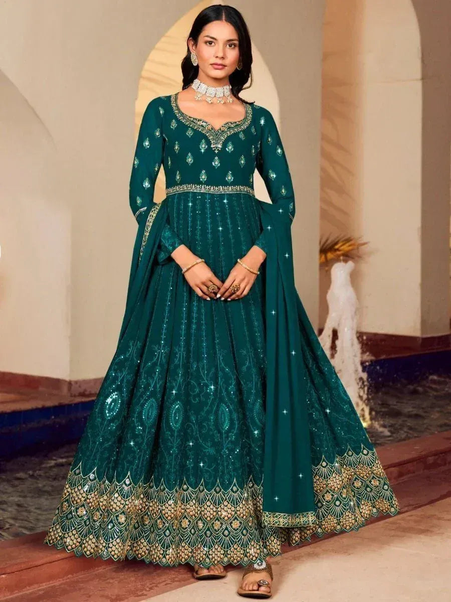 Emerald green designer anarkali with gold embroidery, perfect for Indian ethnic occasions