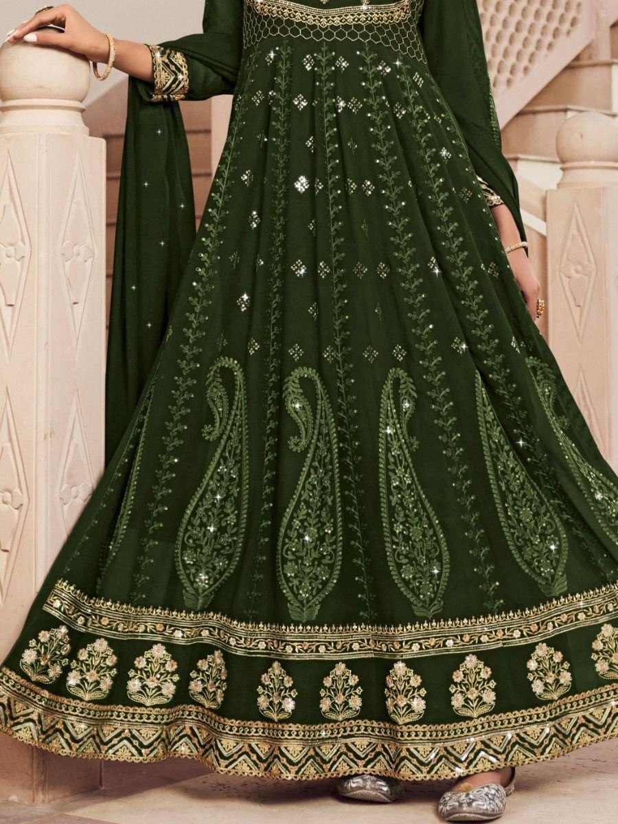 Green ethnic gown with gold embroidery, traditional Indian pattern, full-length dress
