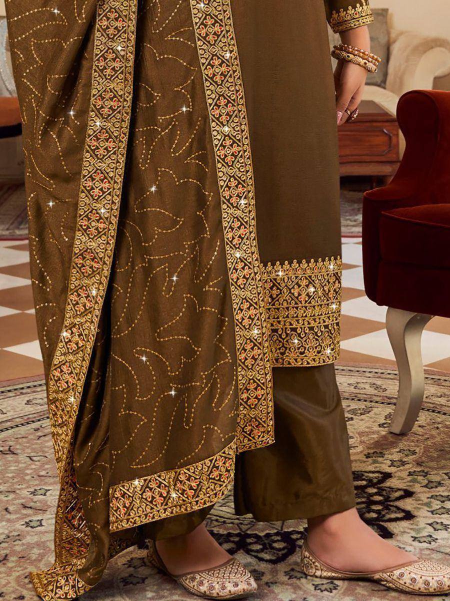 Brown embroidered salwar kameez with gold detailing, matching dupatta and juttis for ethnic wear