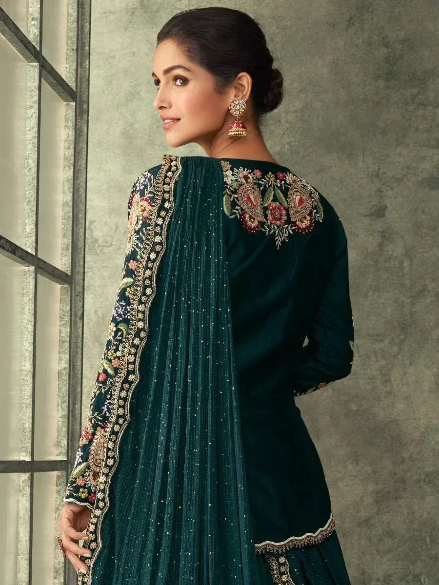 Emerald green embroidered salwar kameez with floral detailing and pleated dupatta, perfect for Indian ethnic wear.