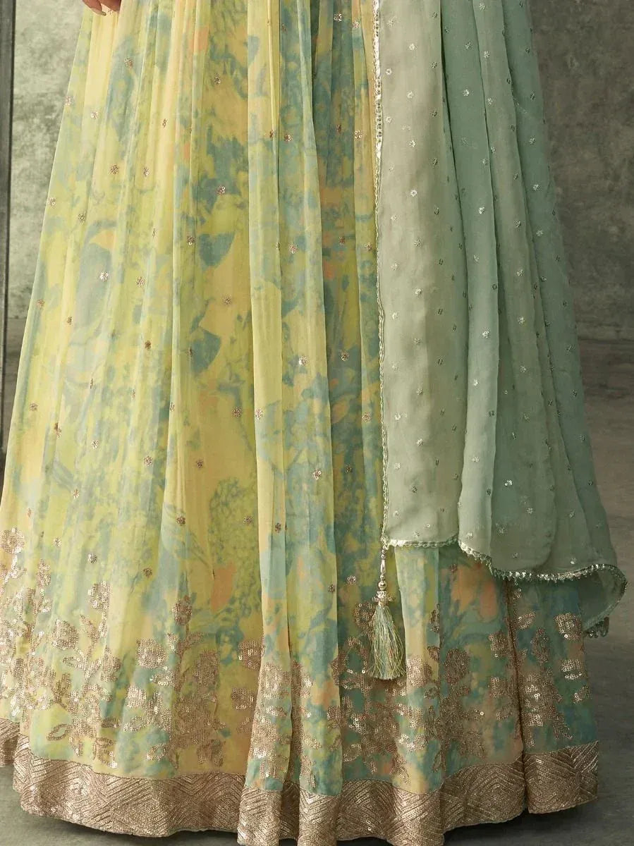 Yellow and mint green floral lehenga with gold embroidery and sheer dupatta for Indian ethnic wear