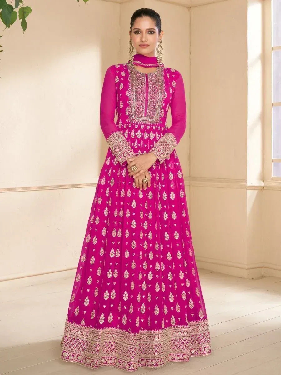 Pink embroidered anarkali gown with gold detailing, perfect for Indian ethnic occasions