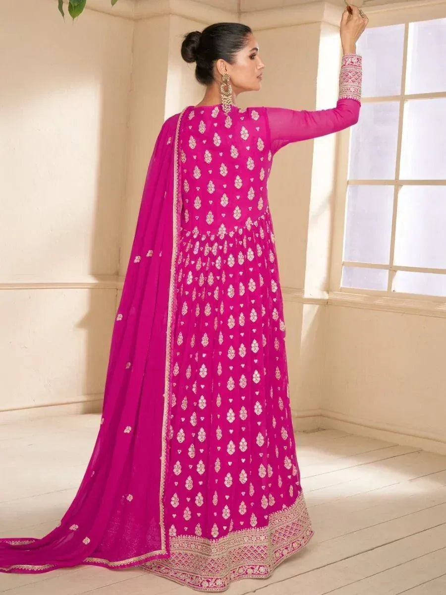 Fuchsia ethnic anarkali gown with white floral embroidery and matching dupatta, perfect for Indian occasions