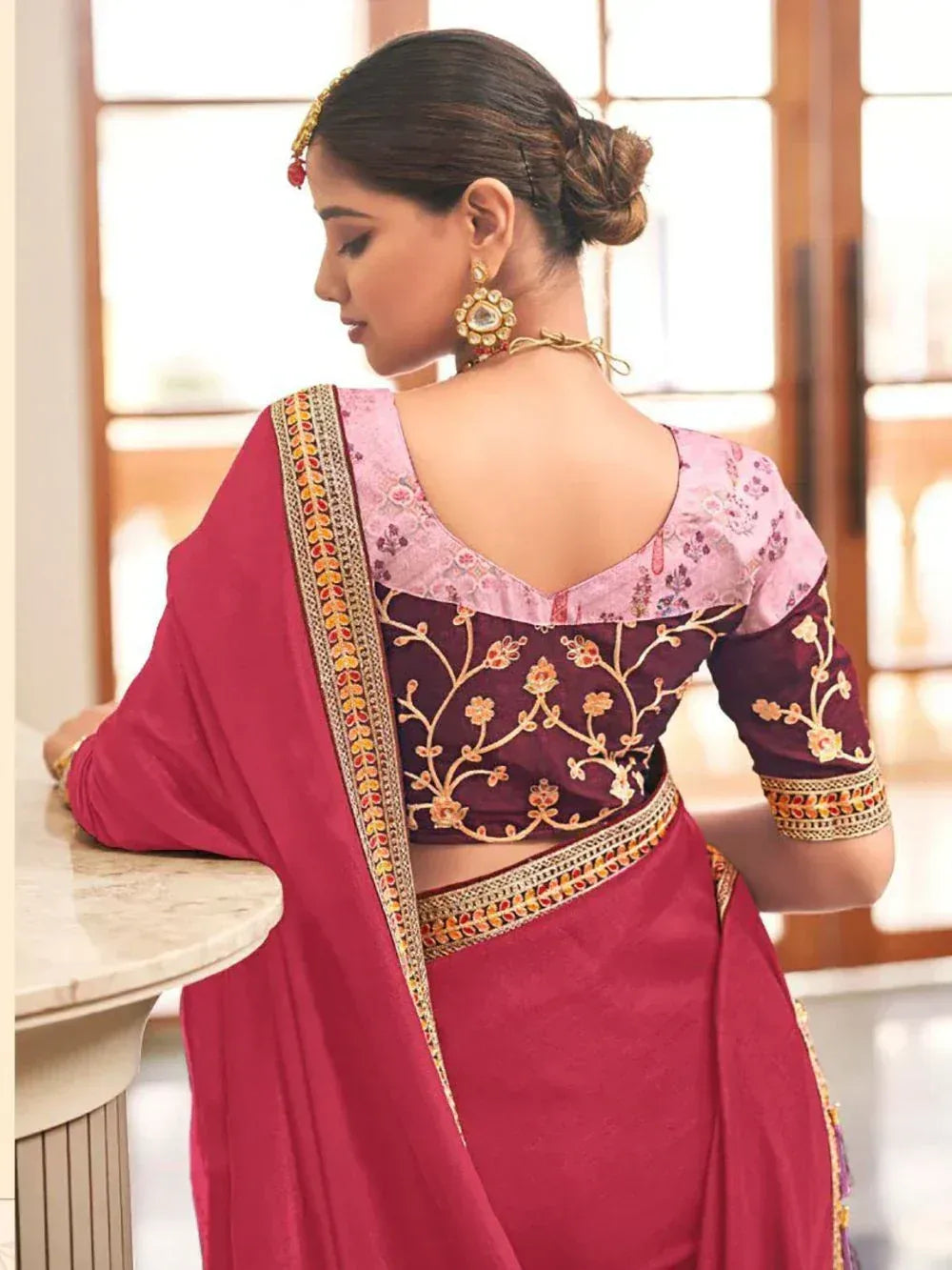 Elegant maroon saree with floral embroidered blouse, perfect for Indian ethnic wear occasions
