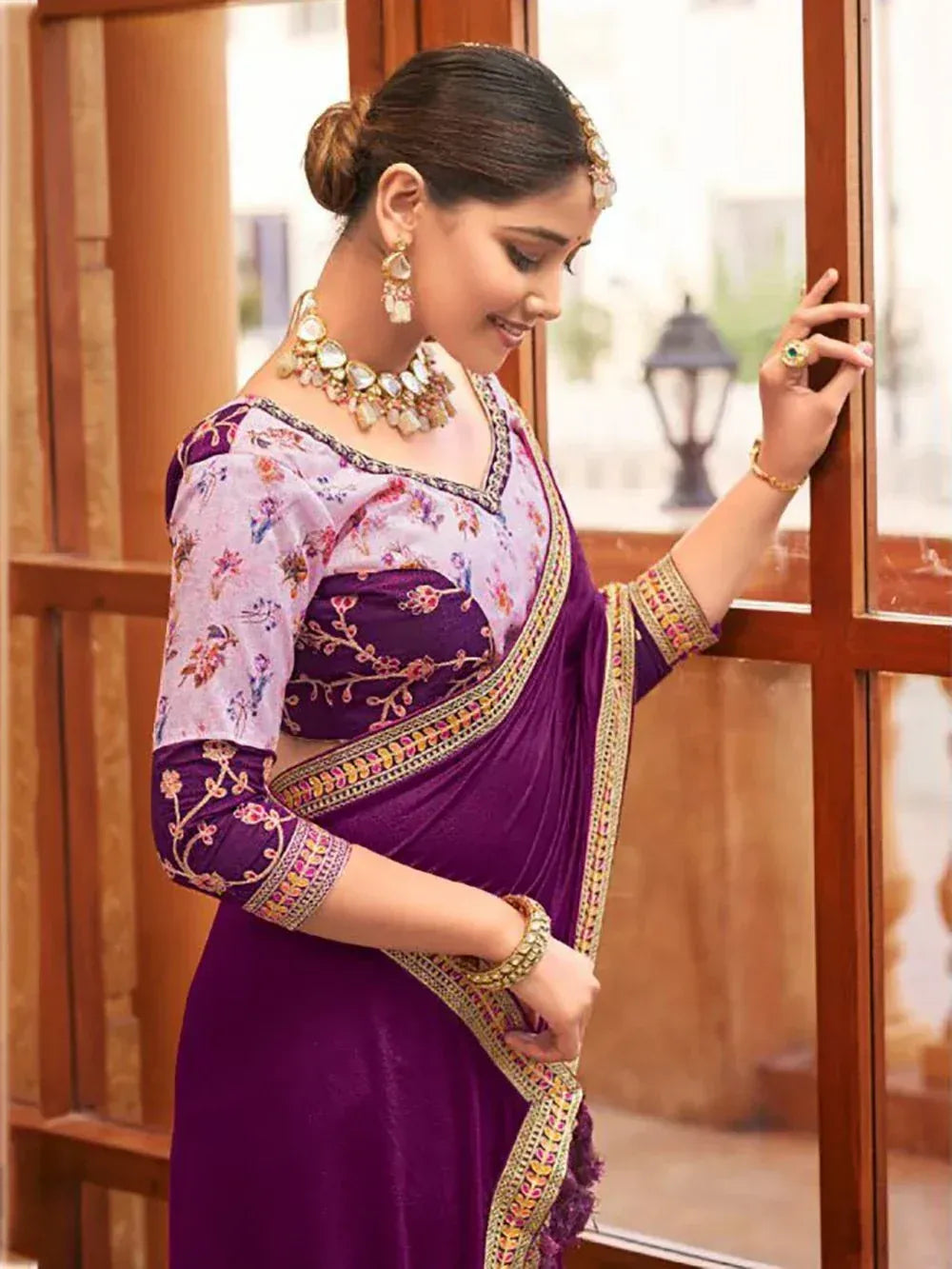 Purple floral embroidered saree with gold border, traditional Indian ethnic wear for women