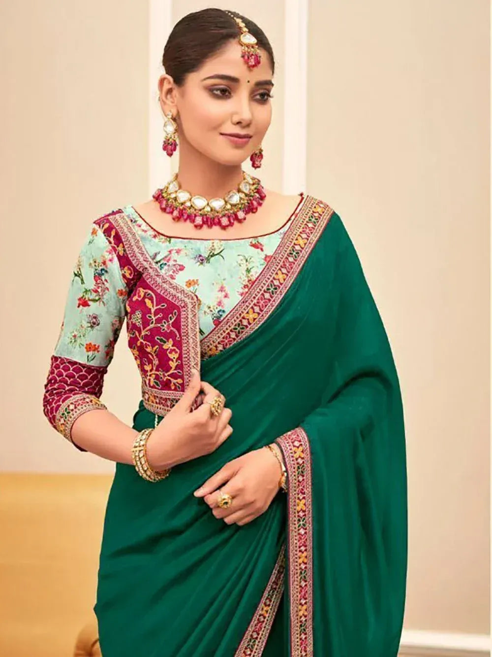 Green embroidered saree with floral blouse, perfect for Indian ethnic occasions and weddings
