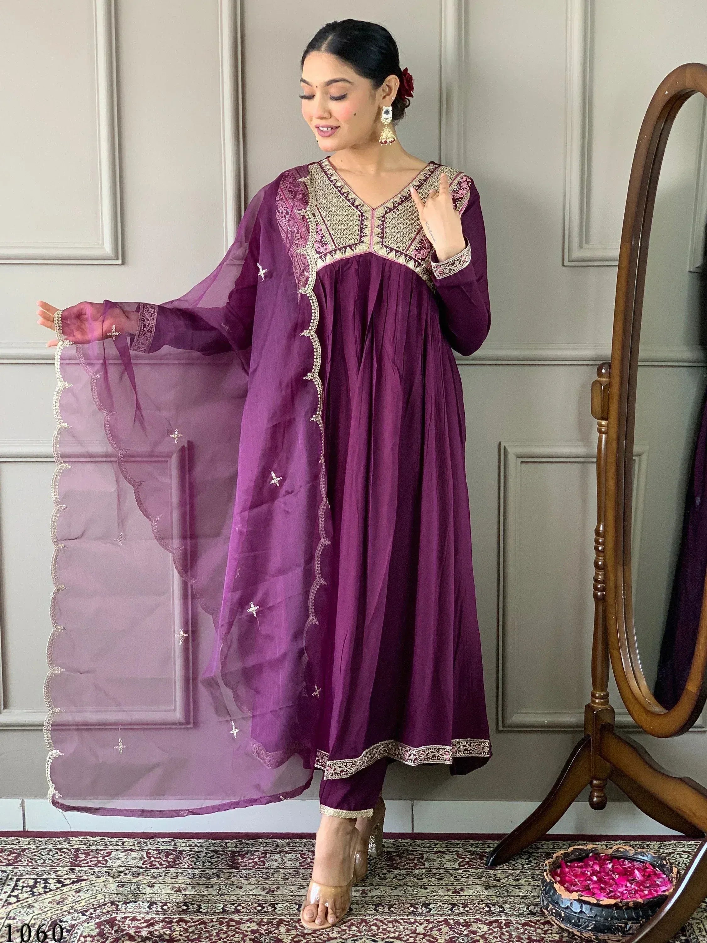 Purple embroidered ethnic gown with matching dupatta, perfect for Indian festive occasions and weddings.