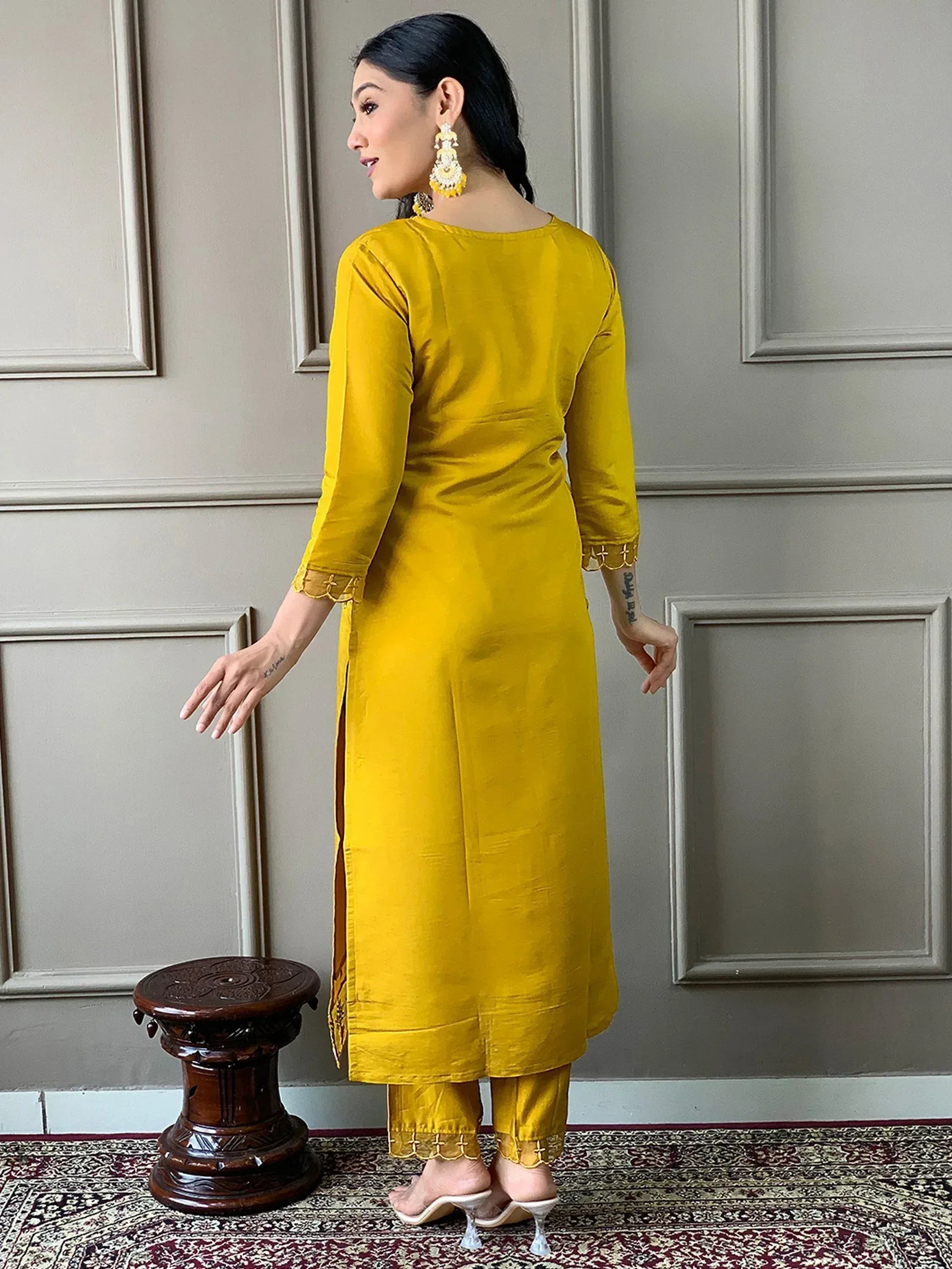 Yellow ethnic kurta with matching pants, side slit, and scalloped cuffs for women
