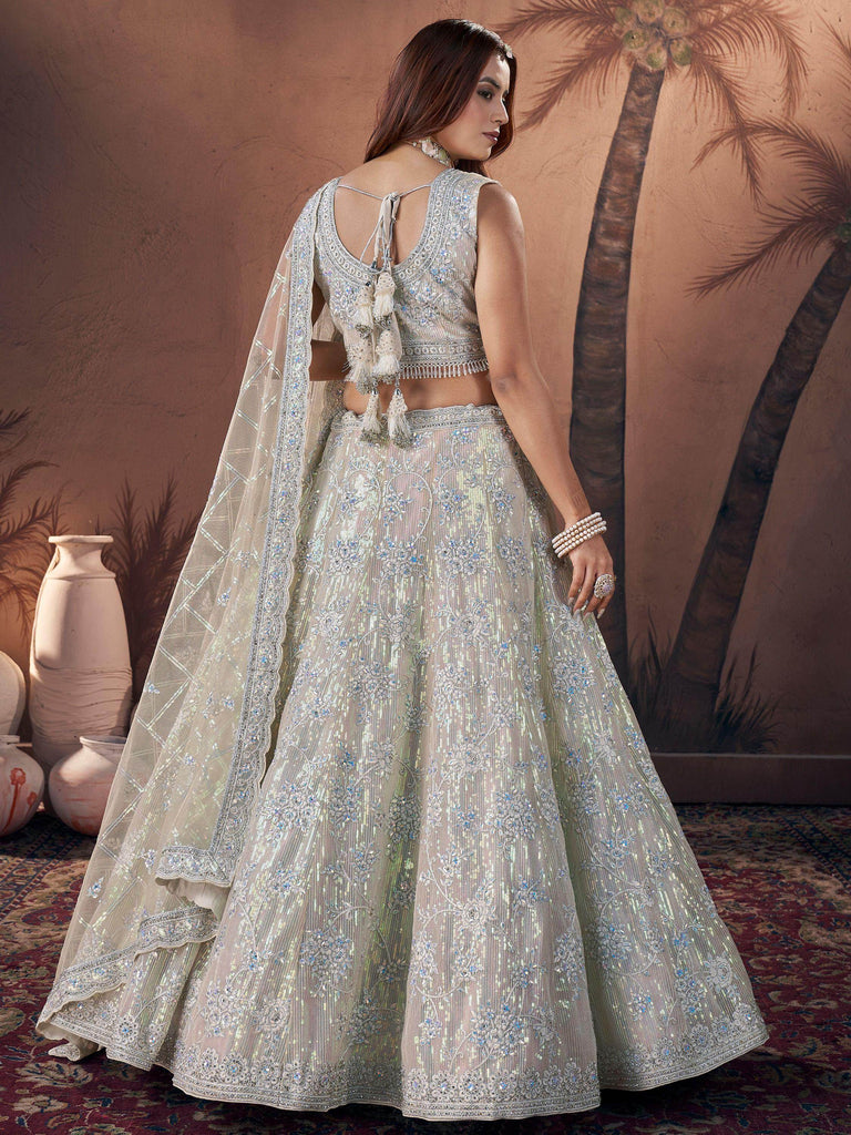 Fantastical Off-White Sequins Net Engagement Wear Lehenga Choli