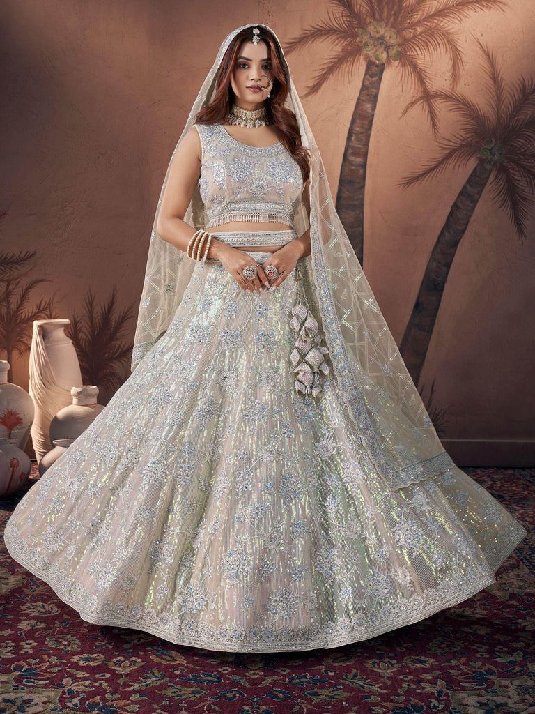 Fantastical Off-White Sequins Net Engagement Wear Lehenga Choli