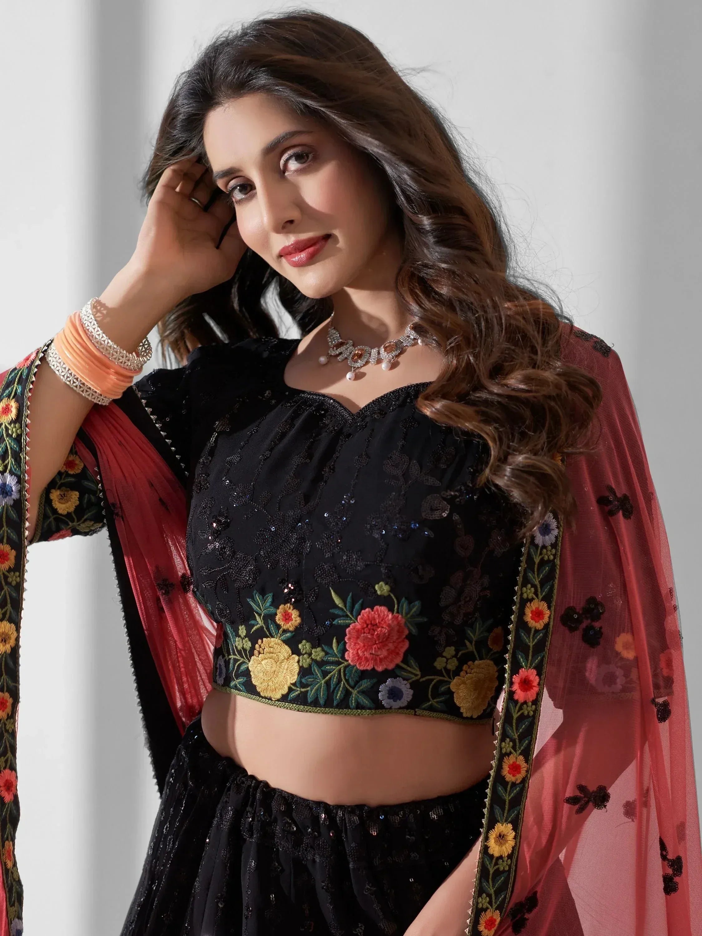 Black floral embroidered lehenga choli with sheer dupatta, ethnic Indian wear for women