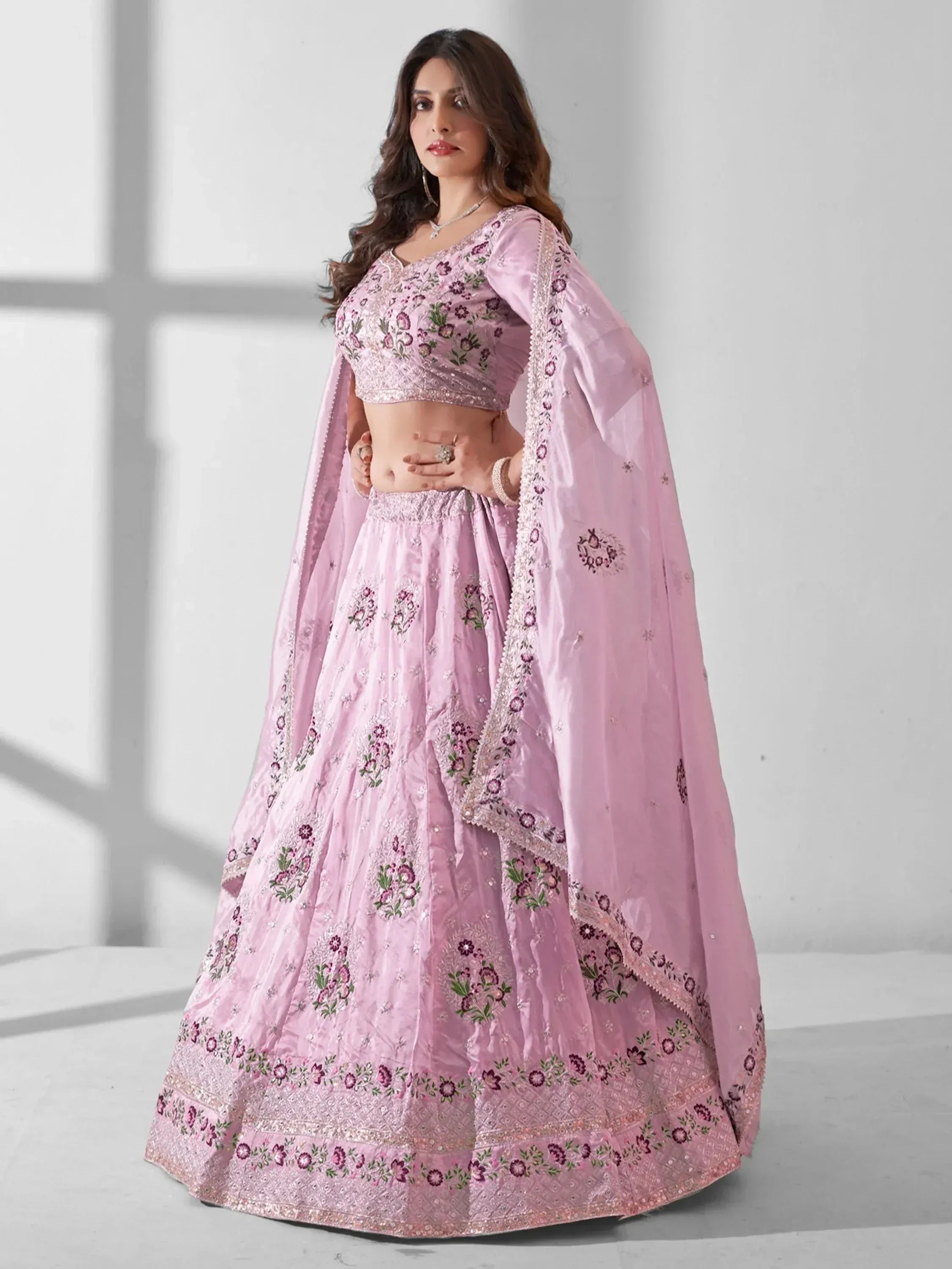 Pink embroidered lehenga choli with floral motifs and dupatta, Indian ethnic wear for women
