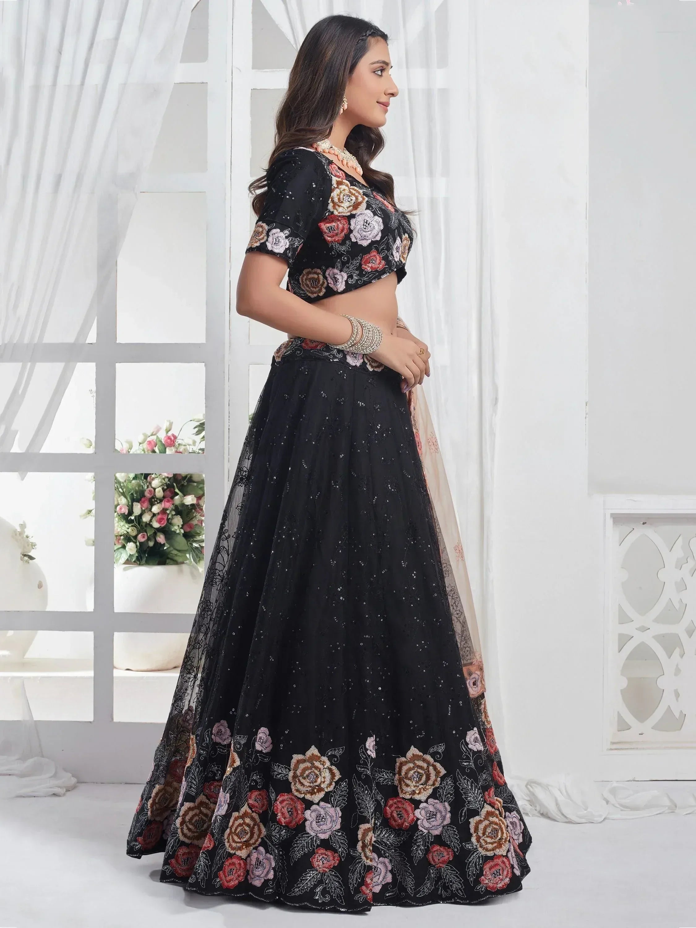 Black floral embroidered lehenga choli with sequins, perfect for Indian ethnic wear events