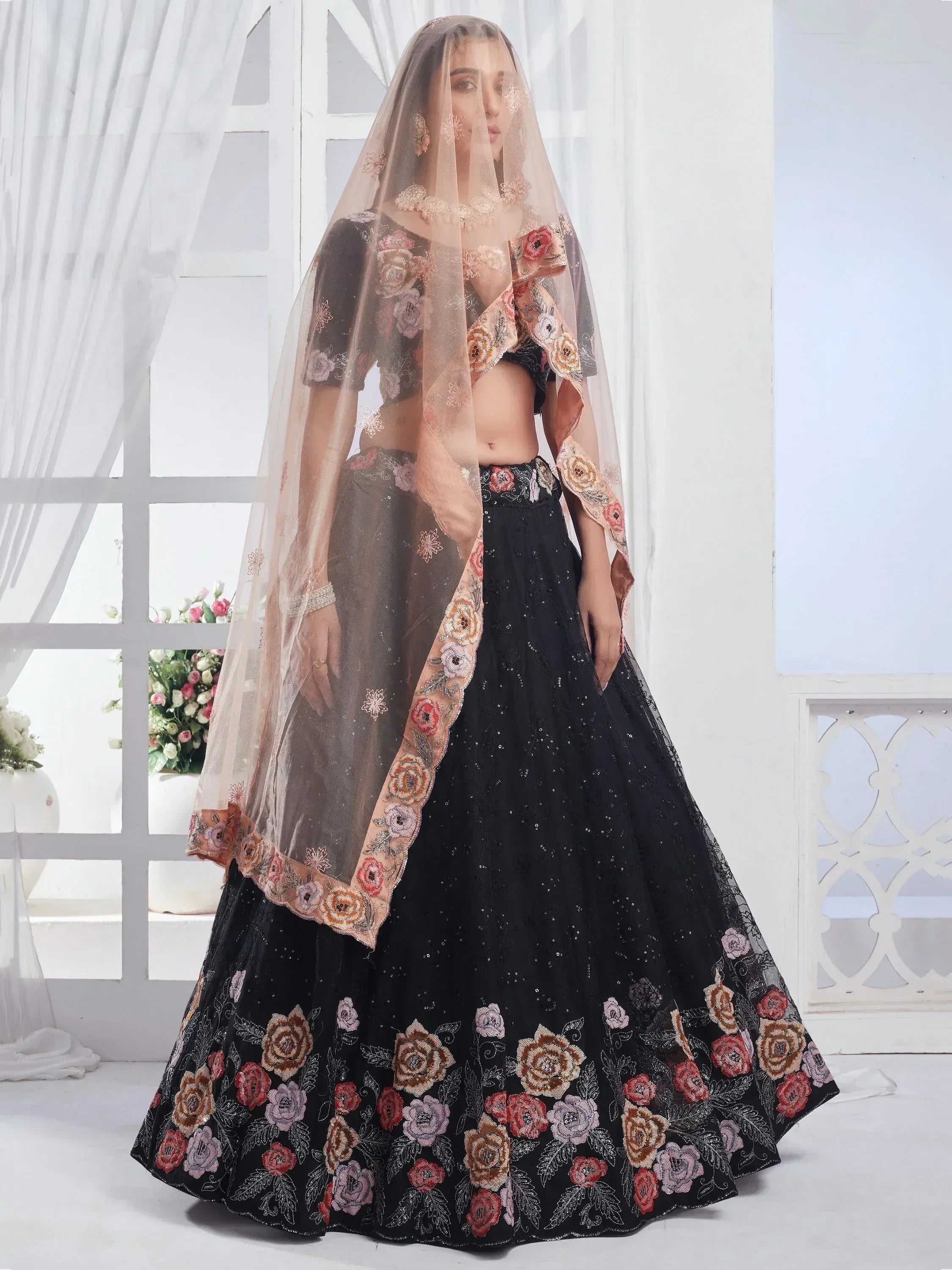 Black floral embroidered lehenga choli with sheer dupatta, Indian ethnic wear for weddings