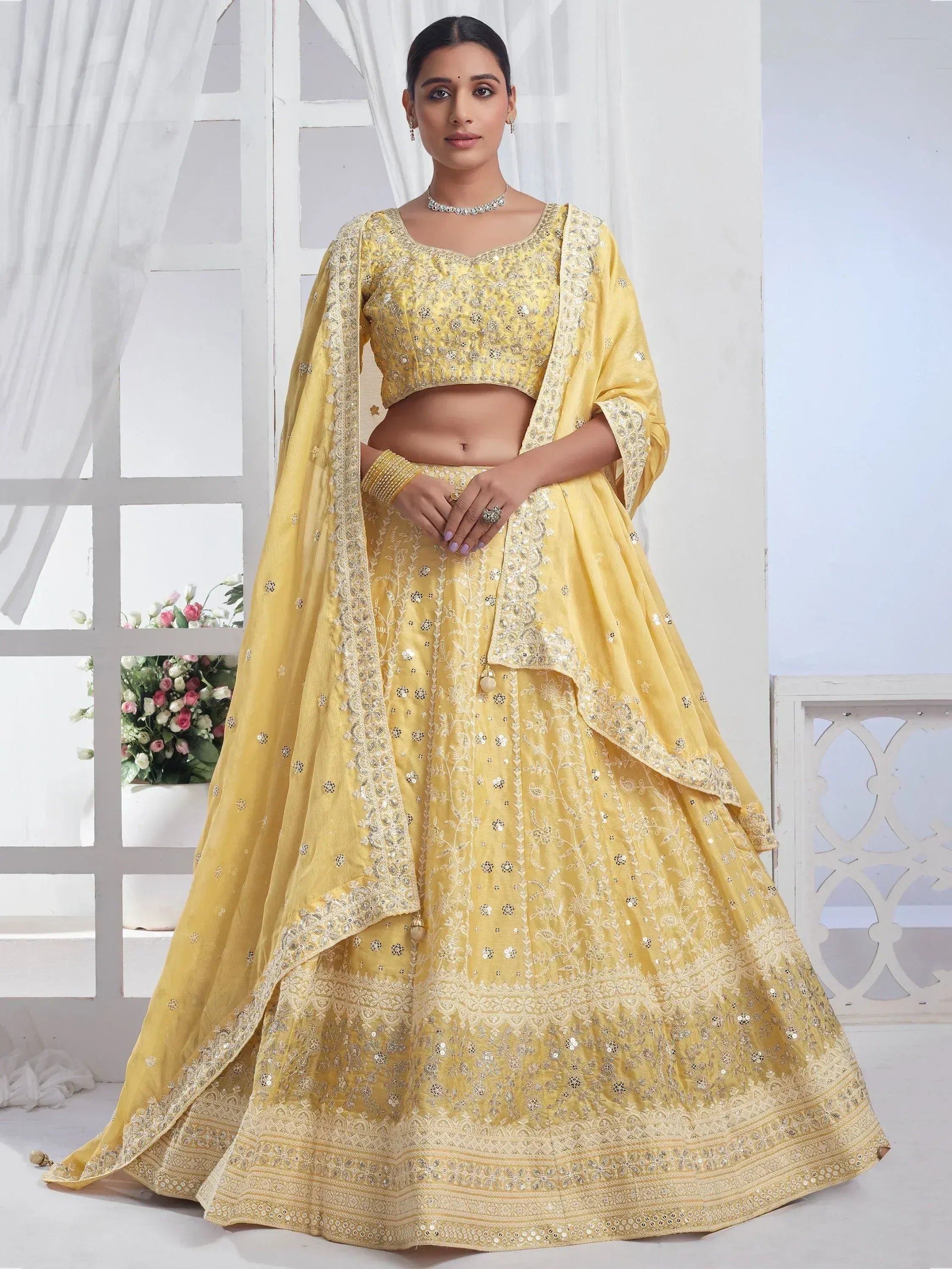 Yellow embroidered lehenga choli with dupatta, Indian ethnic wear for weddings and festivals