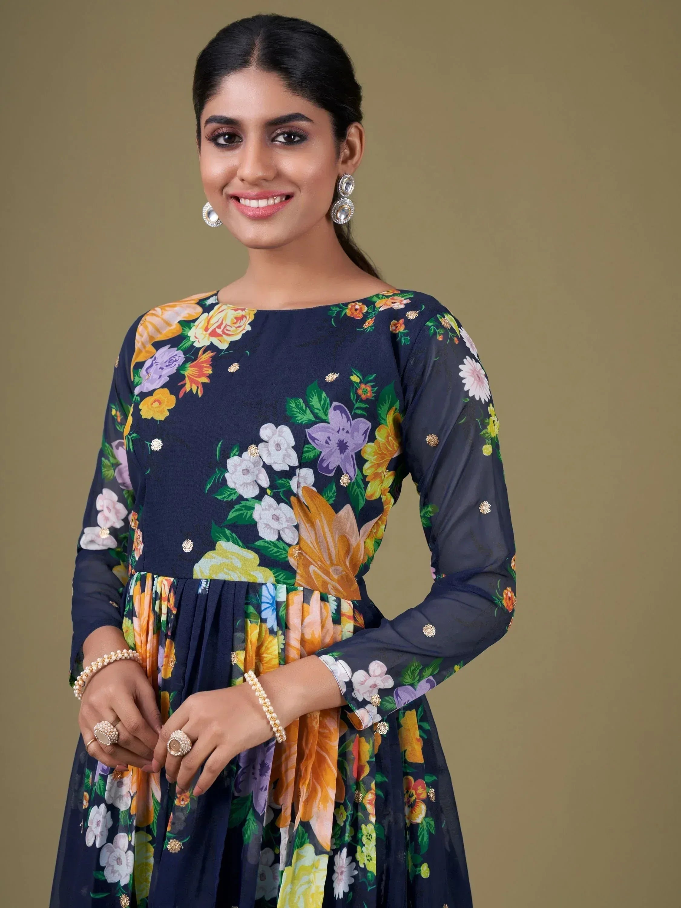 Navy floral print ethnic gown with gold embellishments, perfect for Indian occasions and festive wear