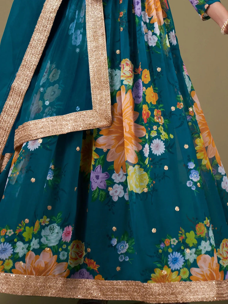 Astonishing Teal Blue Floral Printed Georgette Function Wear Gown