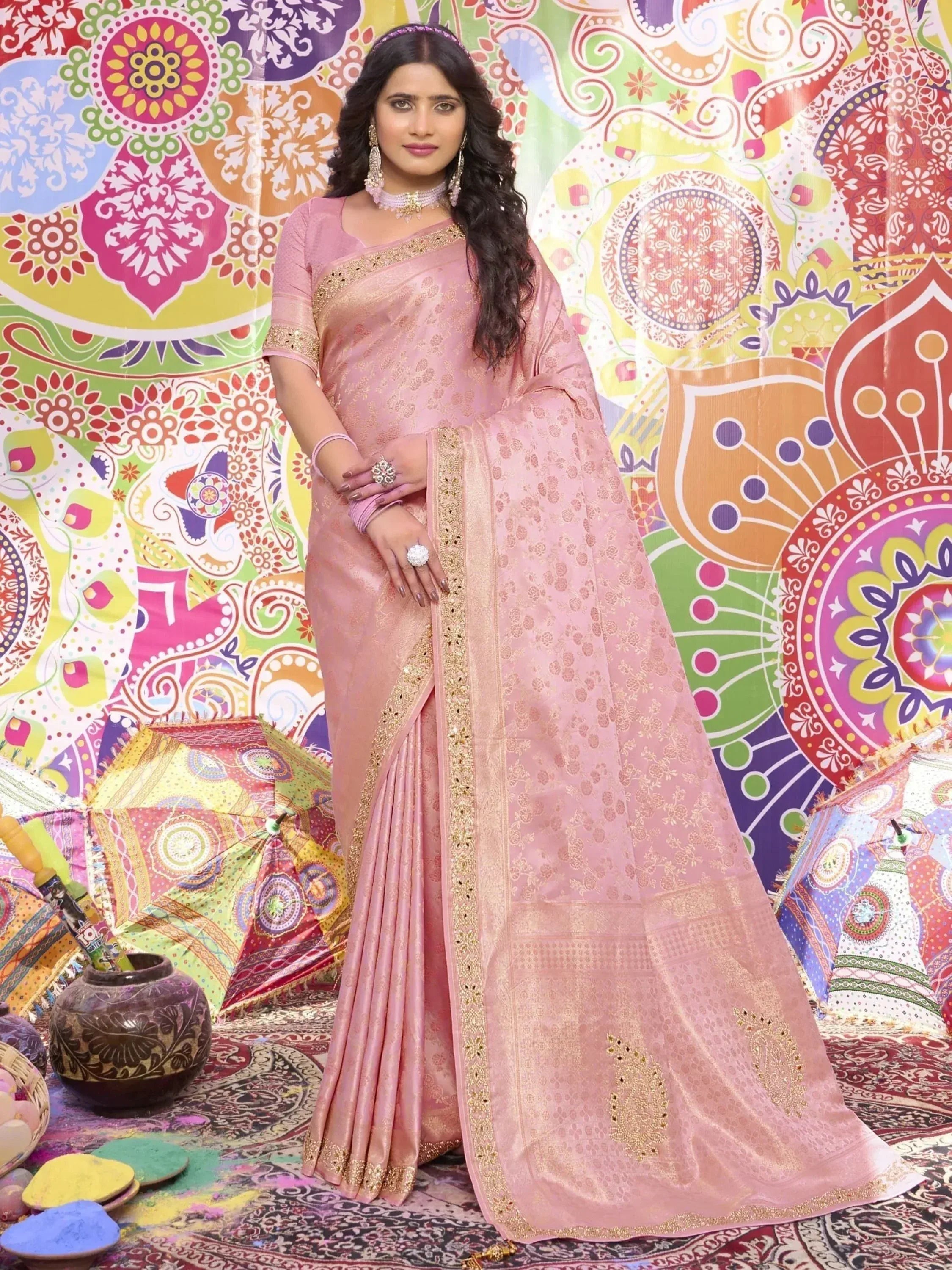 Pink designer saree with gold embroidery, perfect for Indian ethnic wear and festive occasions