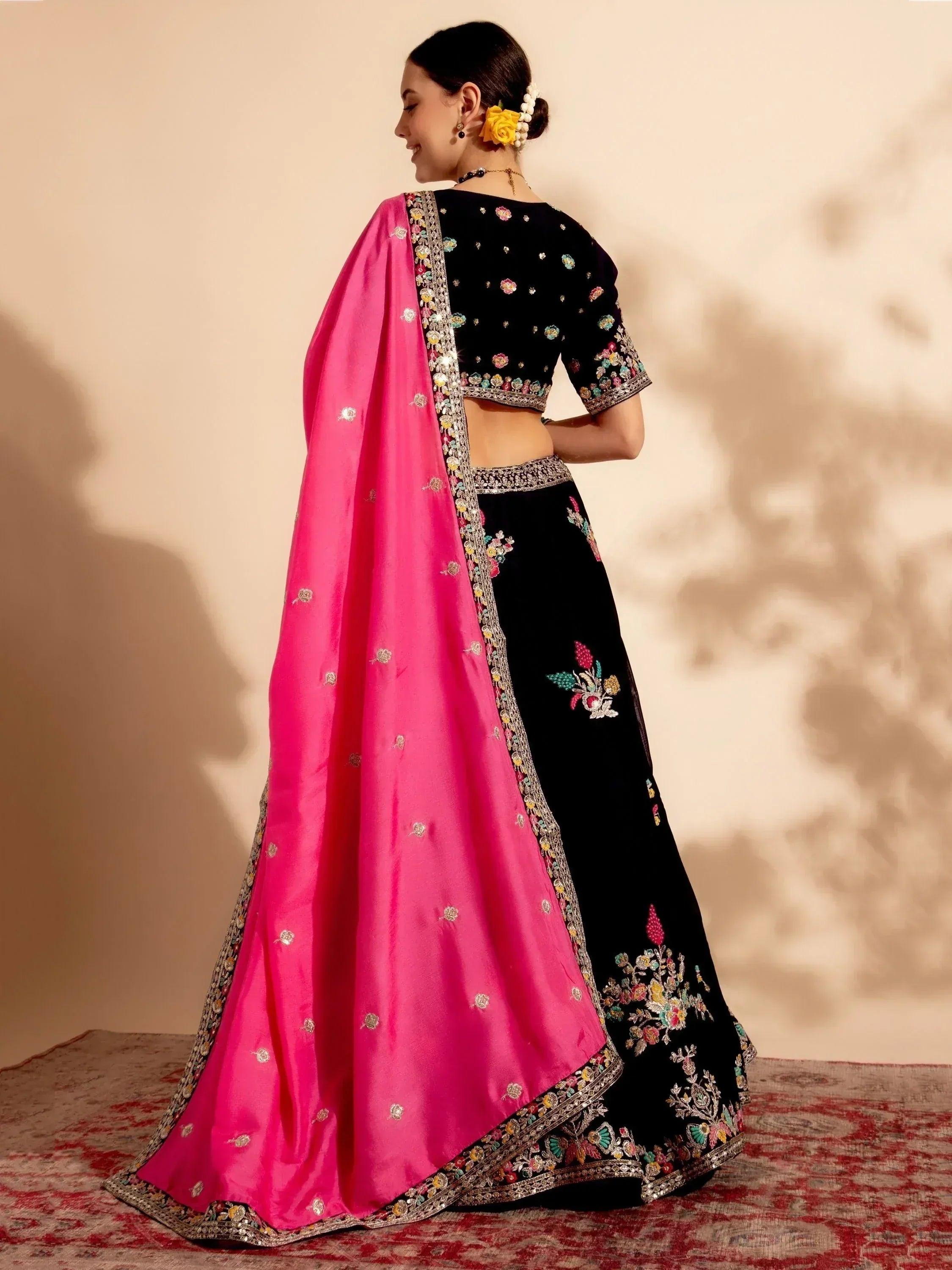 Black embroidered lehenga choli with pink dupatta, Indian ethnic wear for women