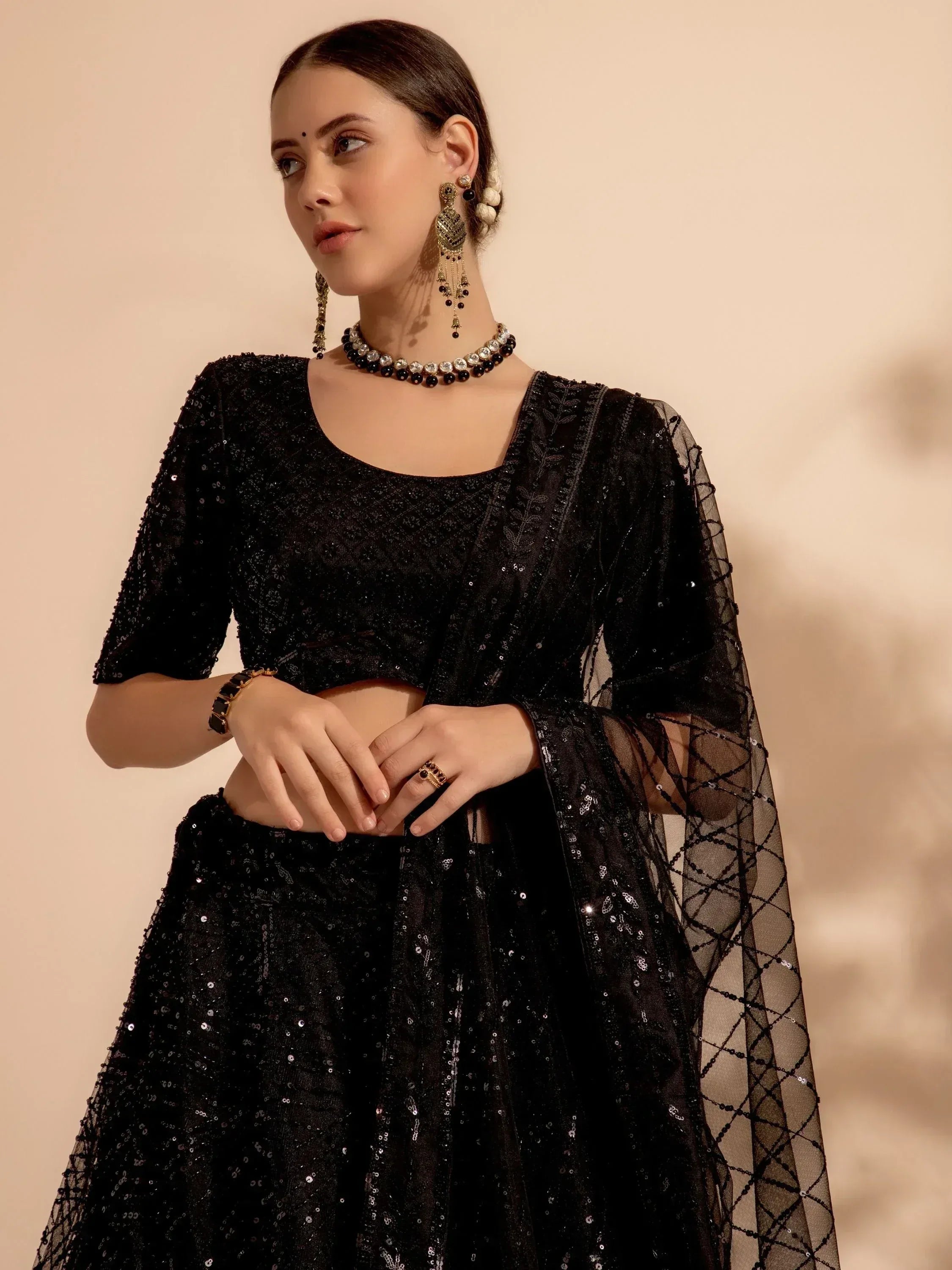 Black sequin lehenga choli with sheer dupatta, ethnic Indian wear for weddings and parties
