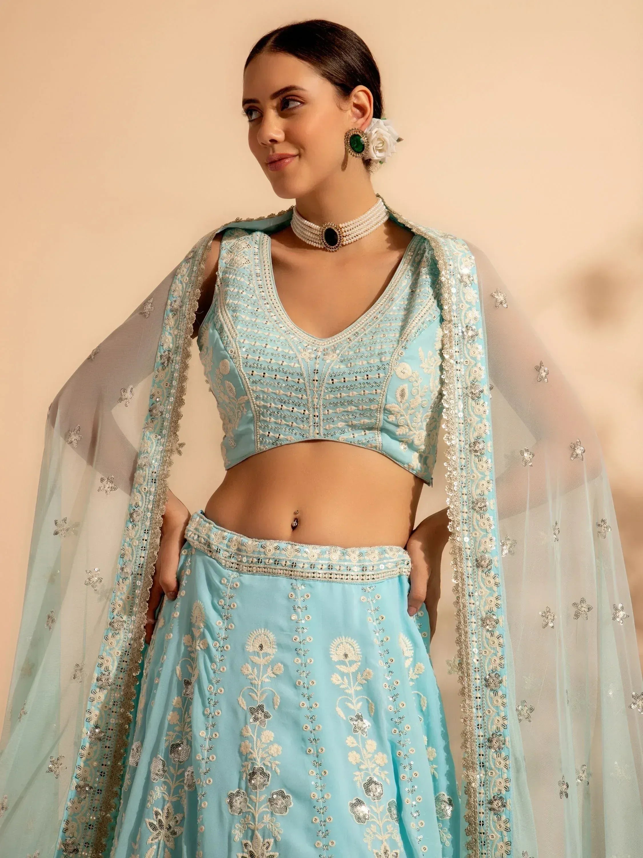 Light blue embroidered lehenga choli with sheer dupatta, perfect for Indian ethnic wear occasions