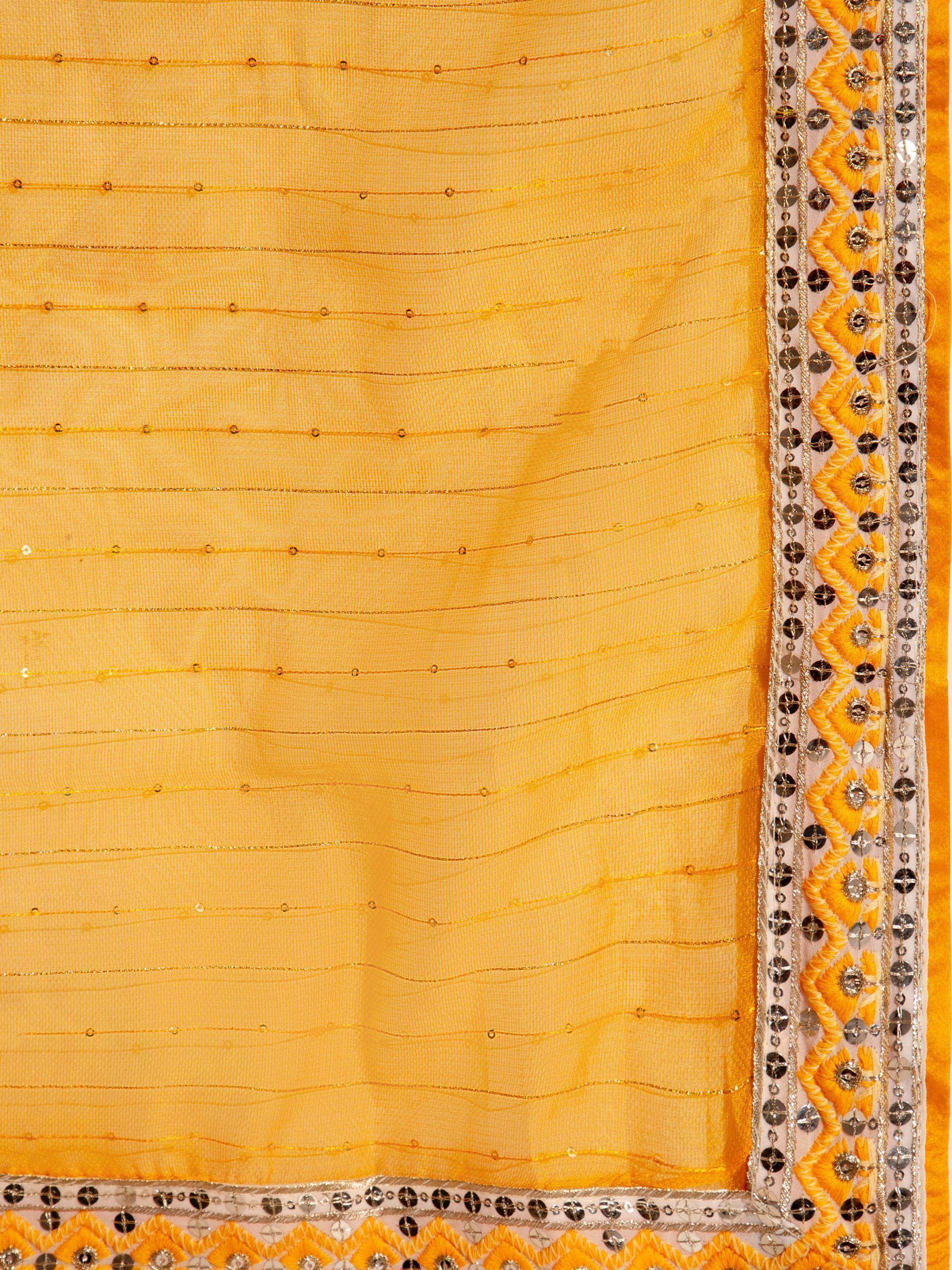 Yellow ethnic saree with sequin border and thread embroidery, perfect for Indian weddings or festive occasions.