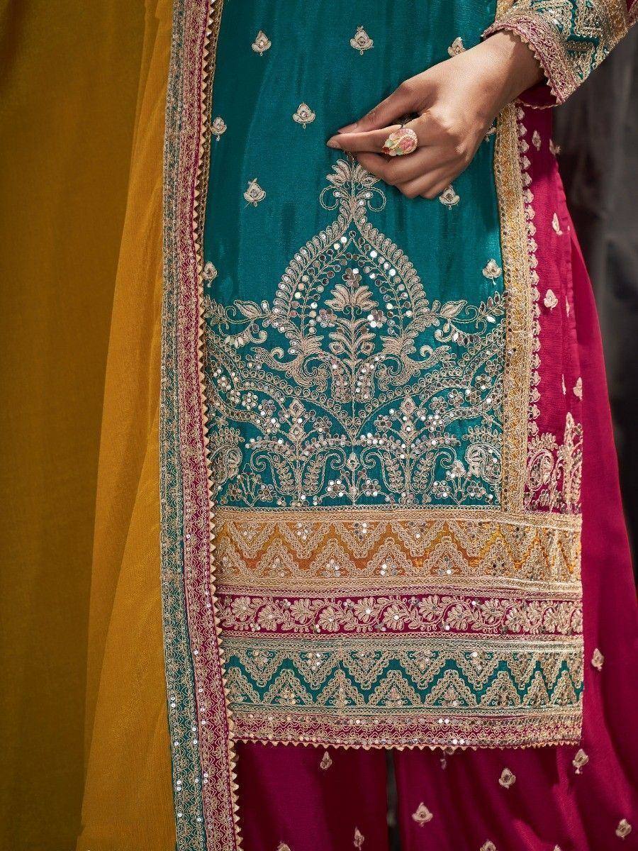 Teal and maroon embroidered salwar kameez with gold mirror work and yellow dupatta, ethnic Indian wear