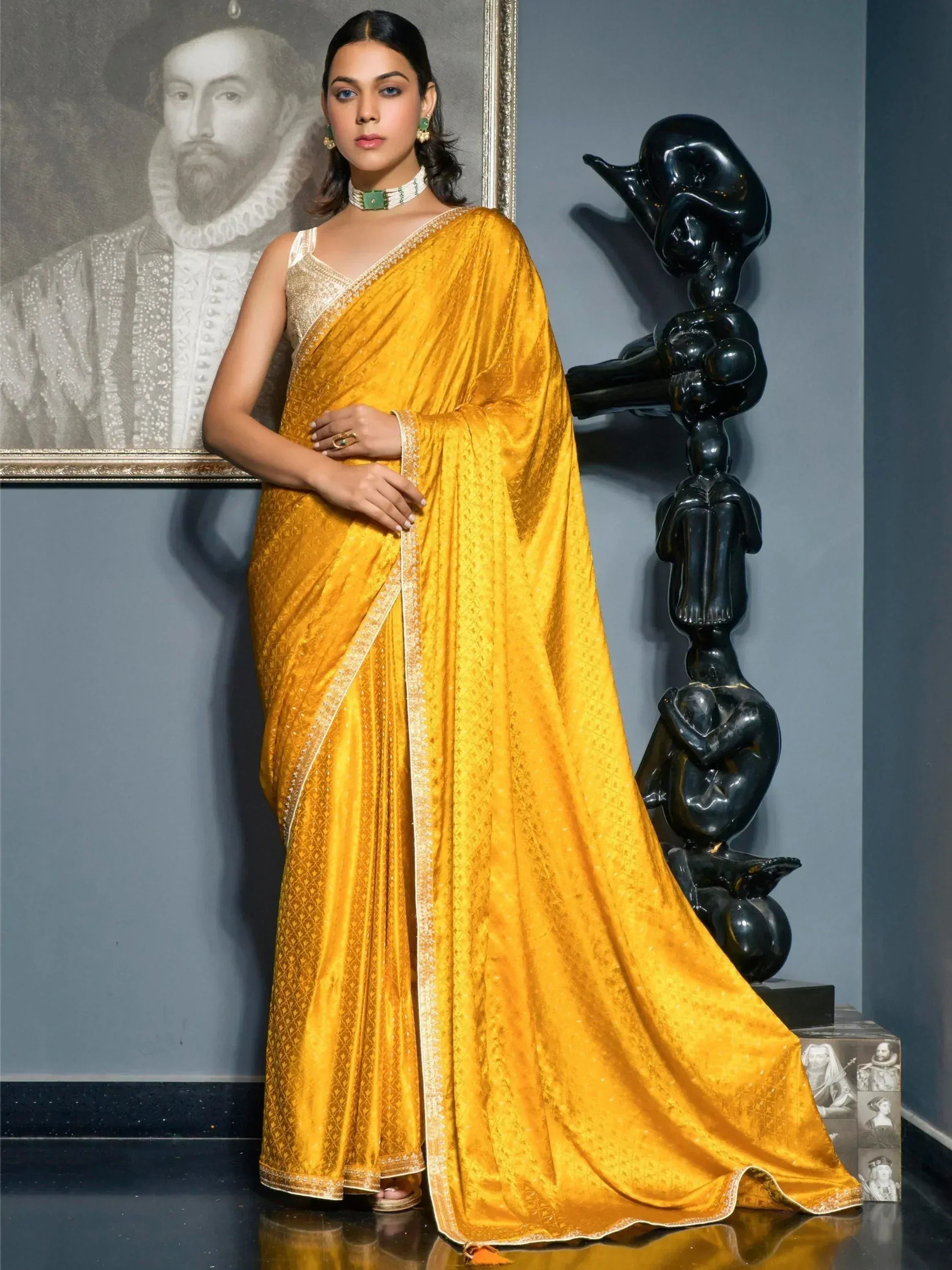 Golden designer saree with intricate embroidery, perfect for Indian ethnic wear occasions