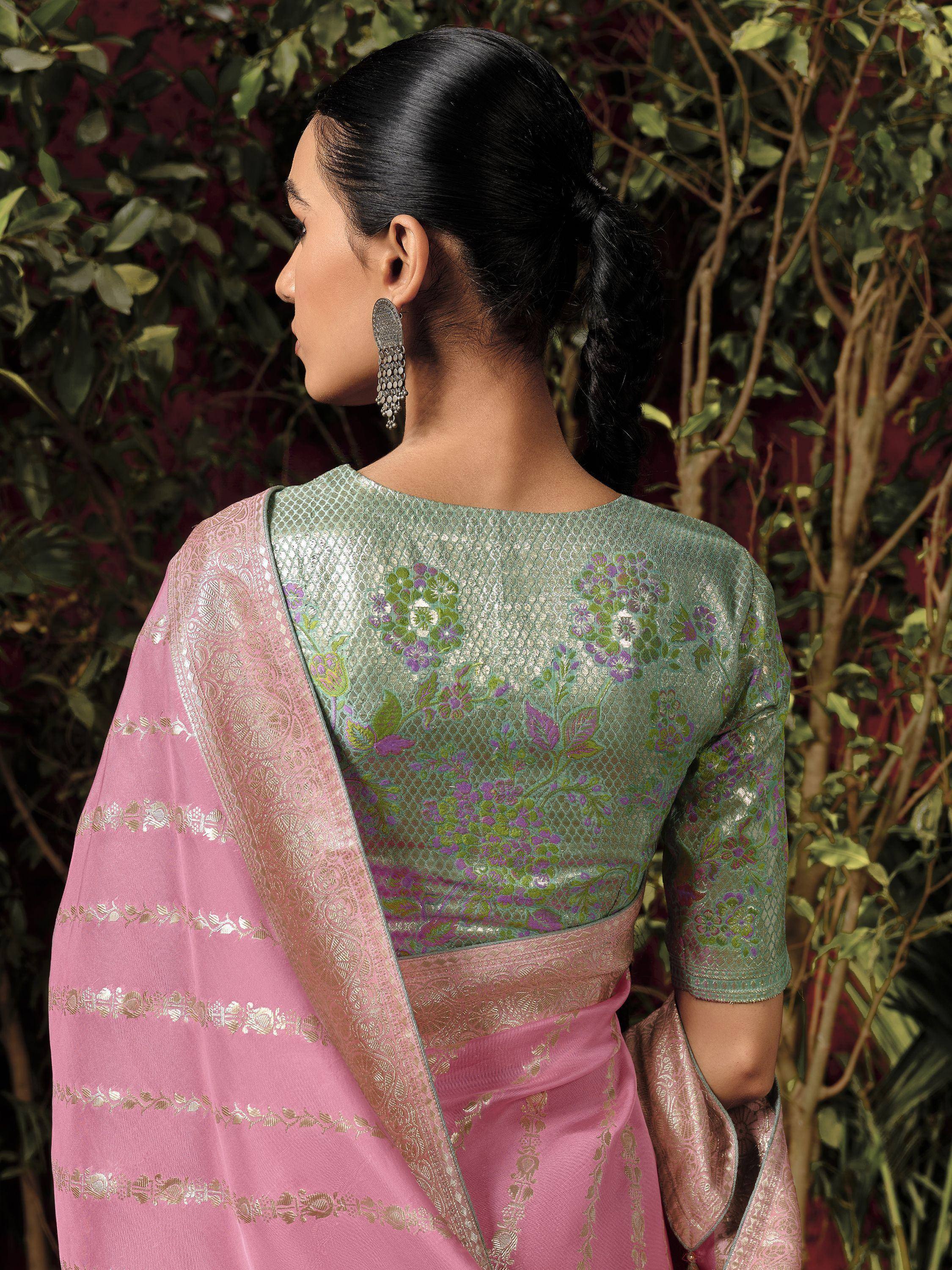 Elegant pink and green floral embroidered saree with gold detailing, perfect for Indian ethnic occasions