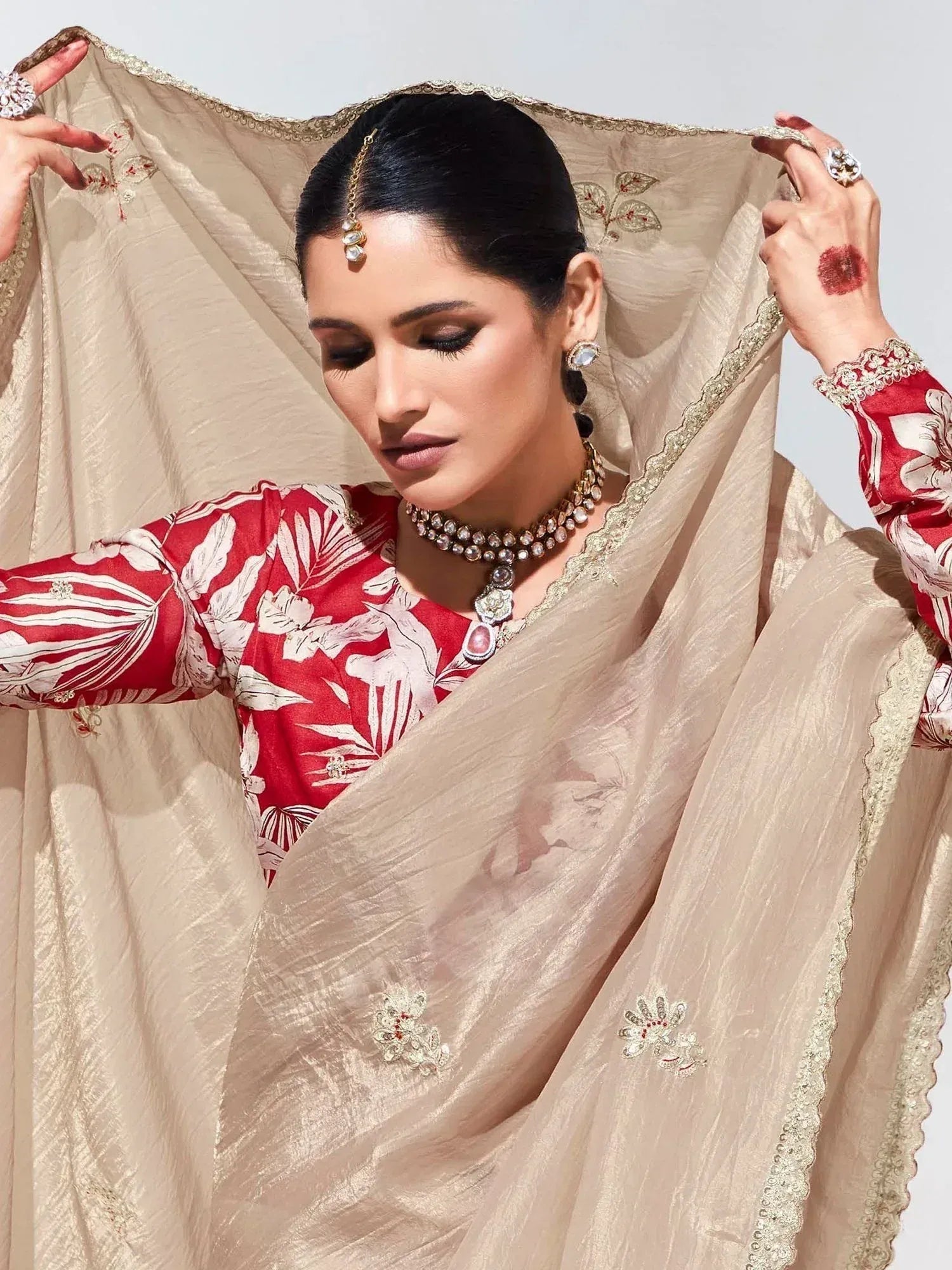 Woman in red floral kurta with beige embroidered dupatta, traditional Indian ethnic wear