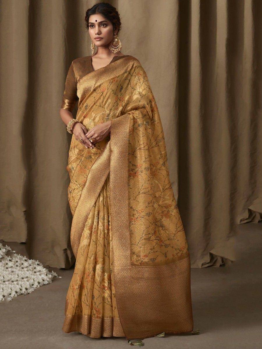 Golden floral print saree with designer blouse, perfect for Indian ethnic wear occasions