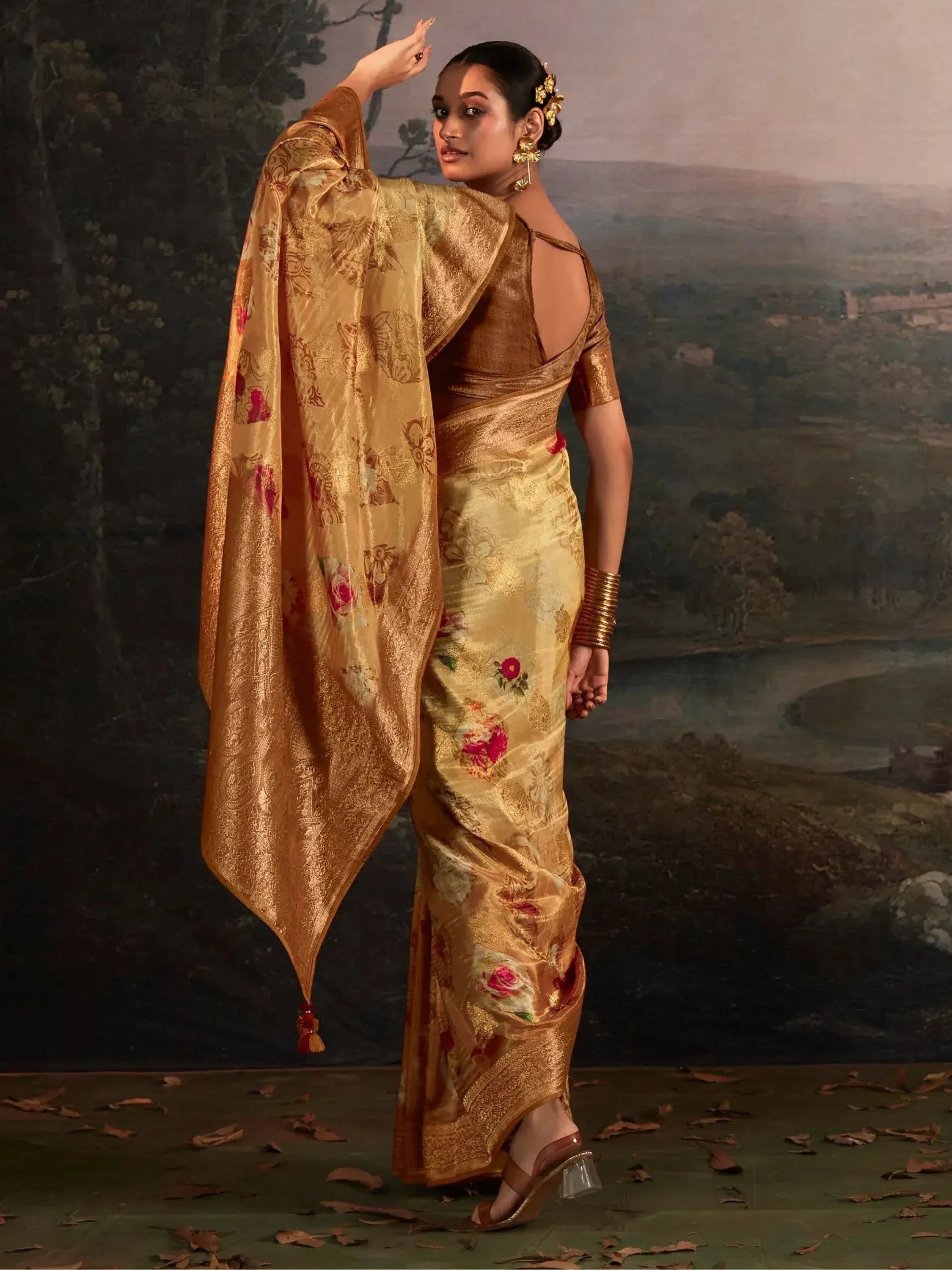 Elegant golden floral saree with designer blouse, perfect for Indian ethnic occasions