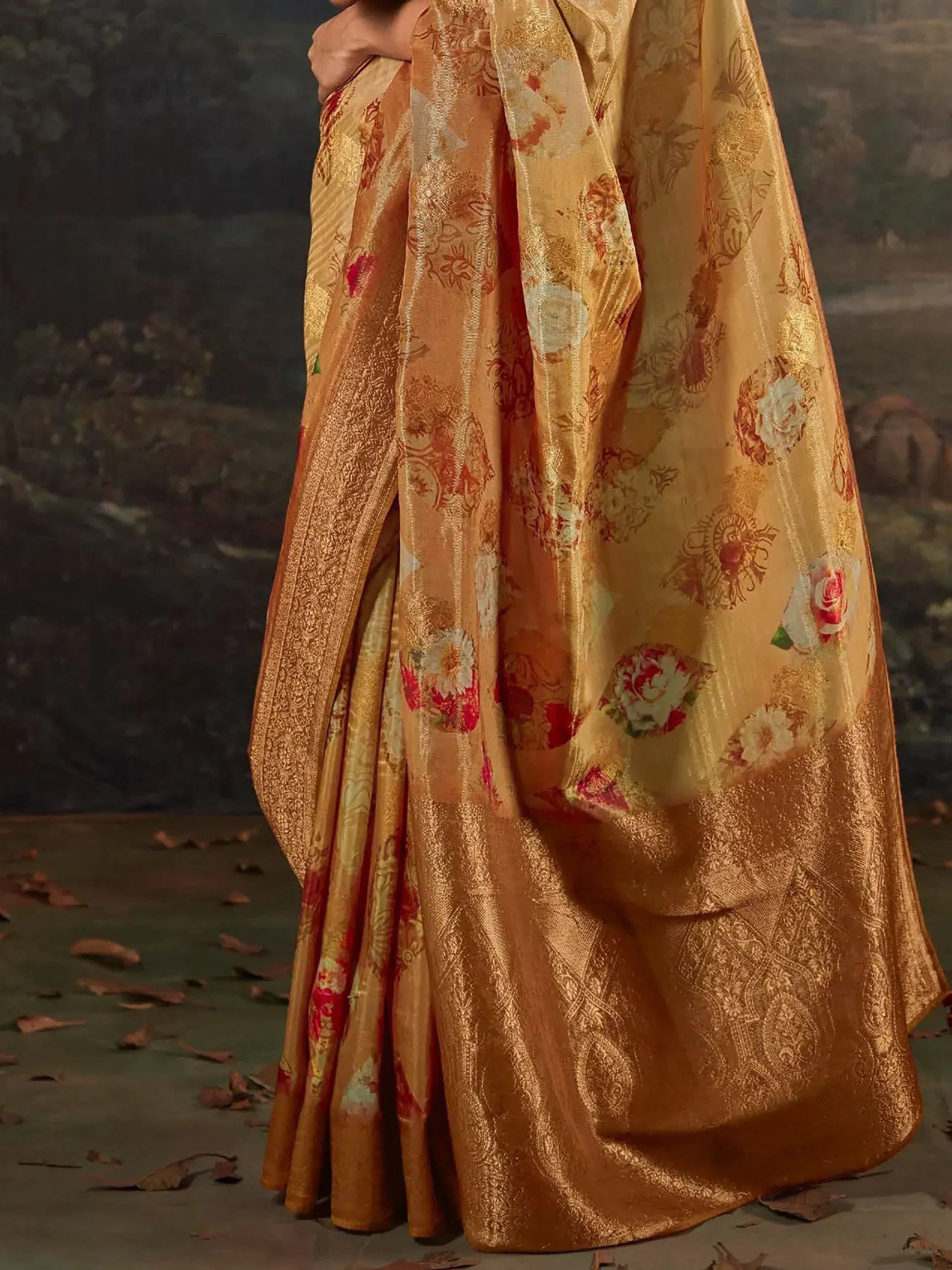 Golden floral saree with intricate embroidery, perfect for Indian ethnic wear and festive occasions.