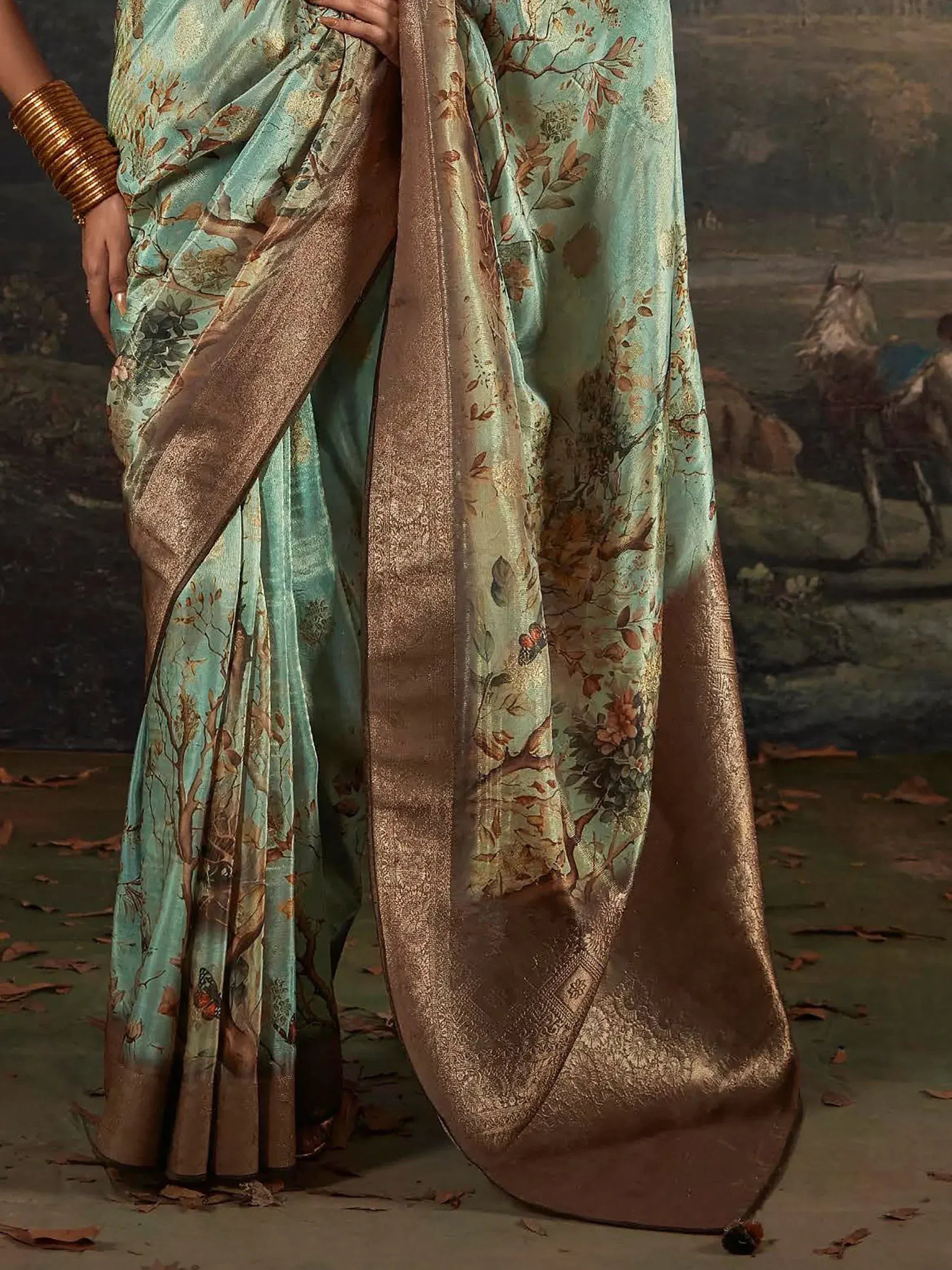 Mint green saree with floral print and gold border, ethnic Indian wear for women
