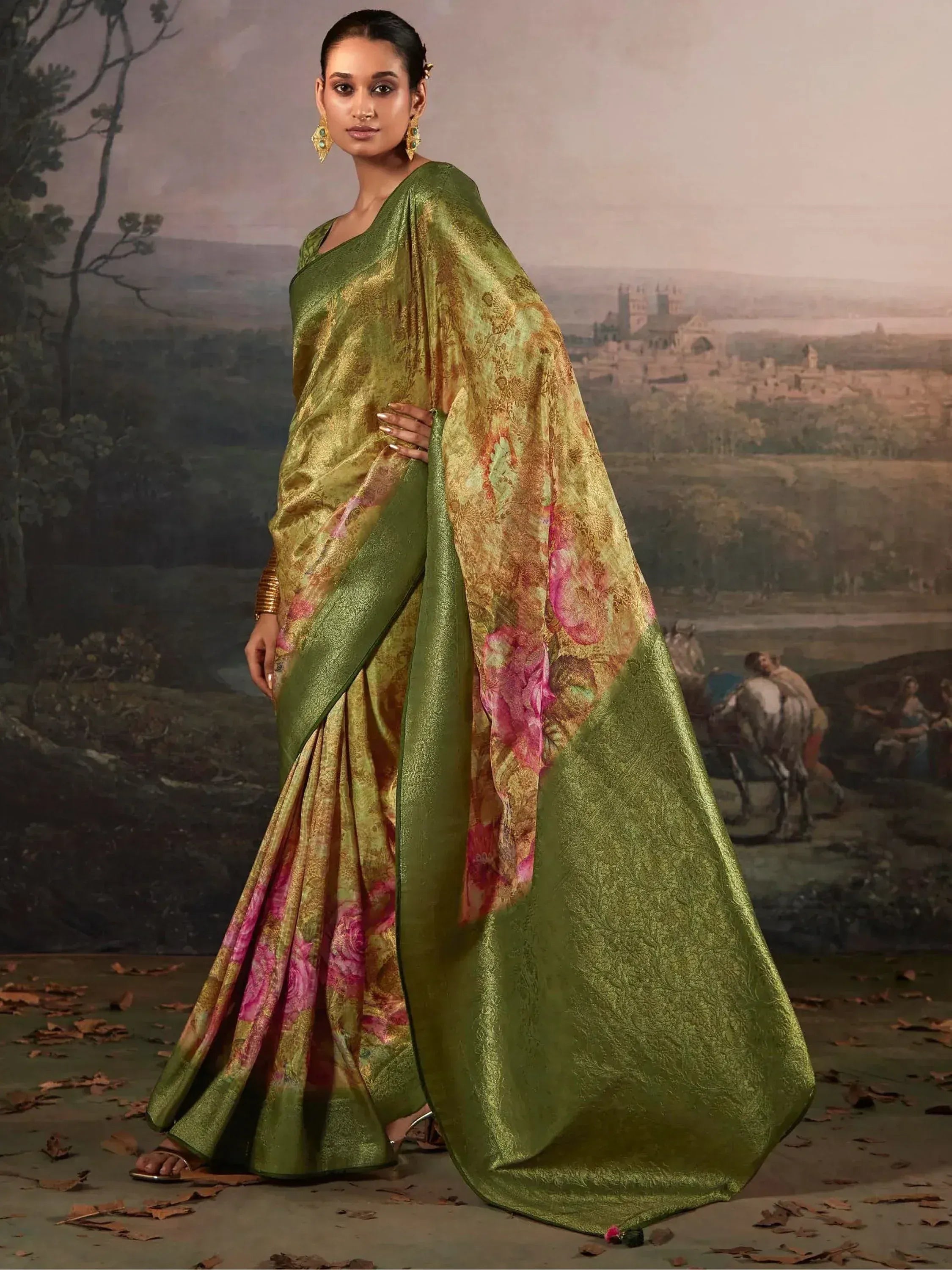 Elegant green saree with floral print, perfect for Indian ethnic wear occasions.