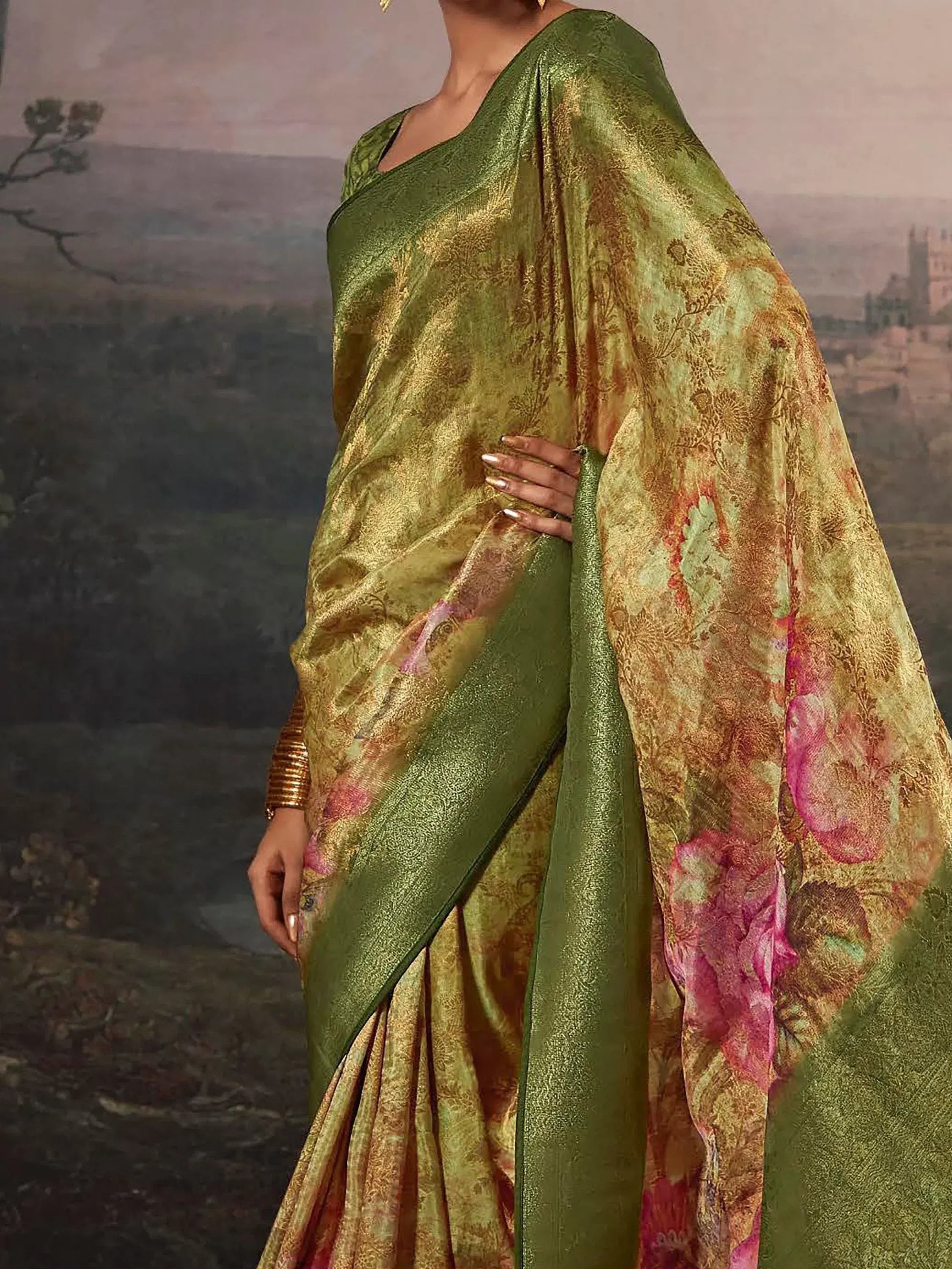 Green floral saree with gold accents, elegant Indian ethnic wear for festive occasions