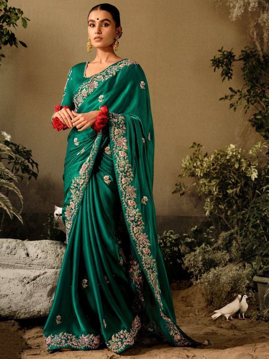 Emerald green embroidered saree with floral detailing, perfect for Indian ethnic occasions