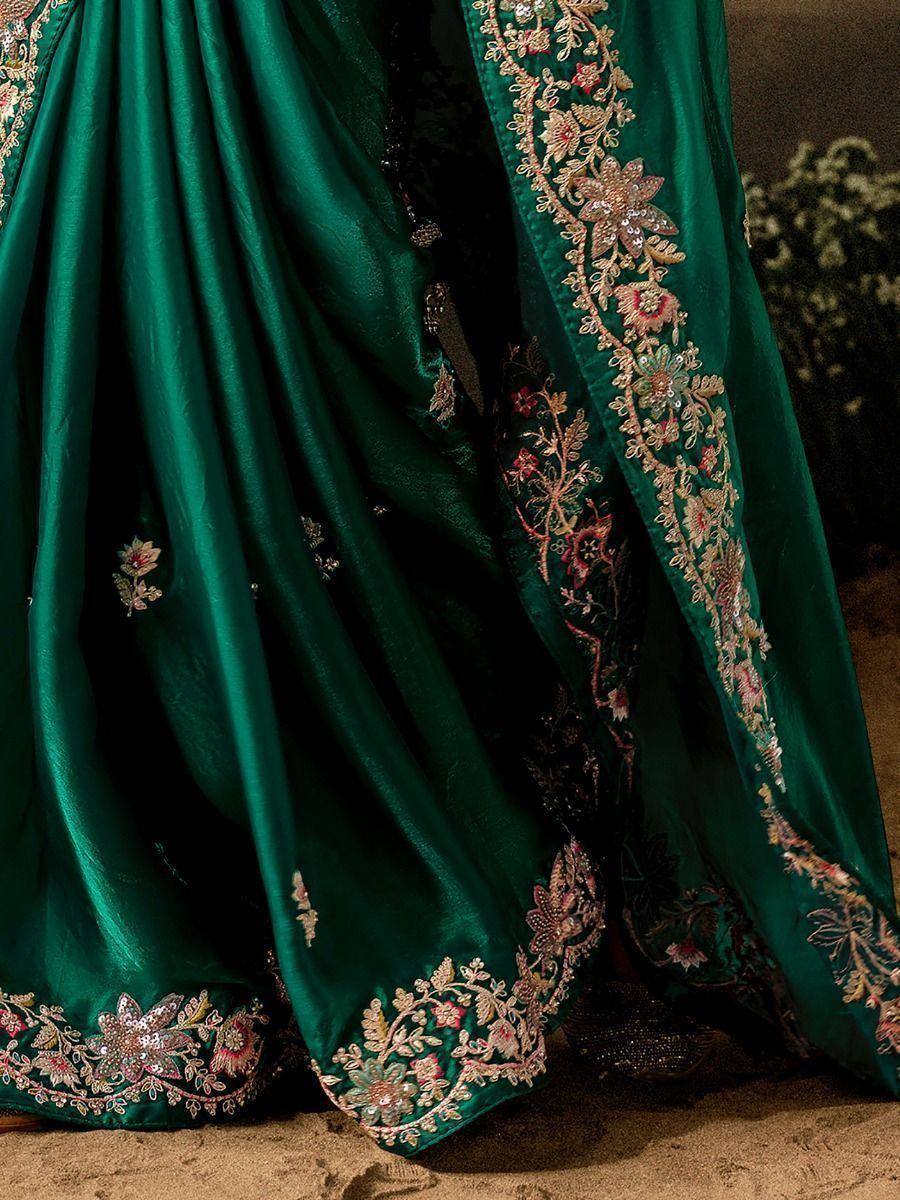 Emerald green lehenga with floral embroidery and sequin detailing, ideal for Indian ethnic wear