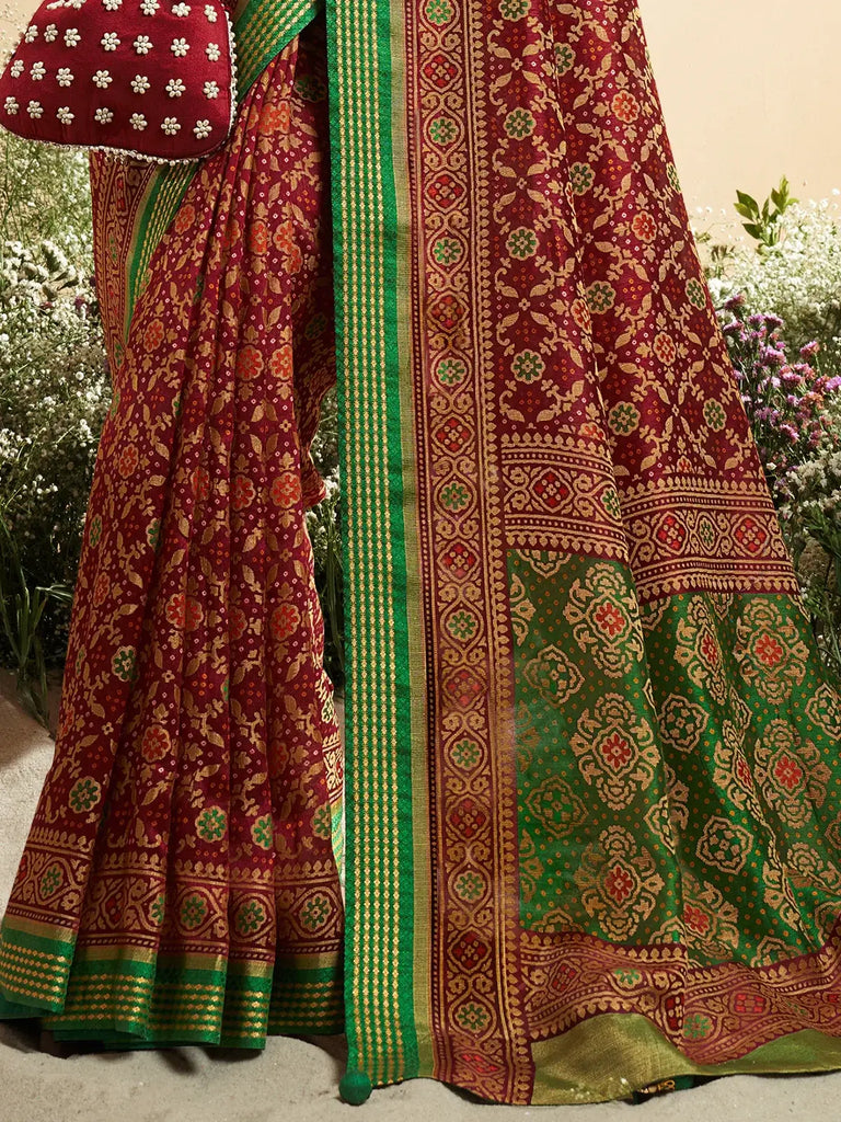 Dazzling Maroon Patola Printed Silk Wedding Wear Saree With Blouse