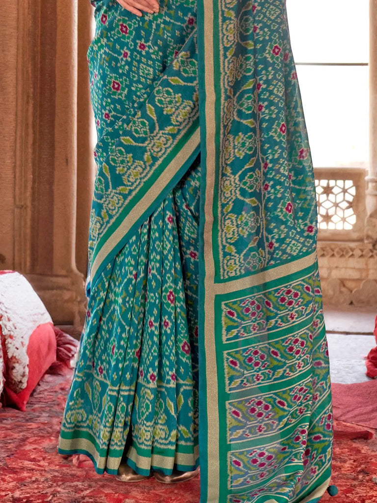 Enchanting Teal Green Patola Printed Georgette Casual Wear Saree