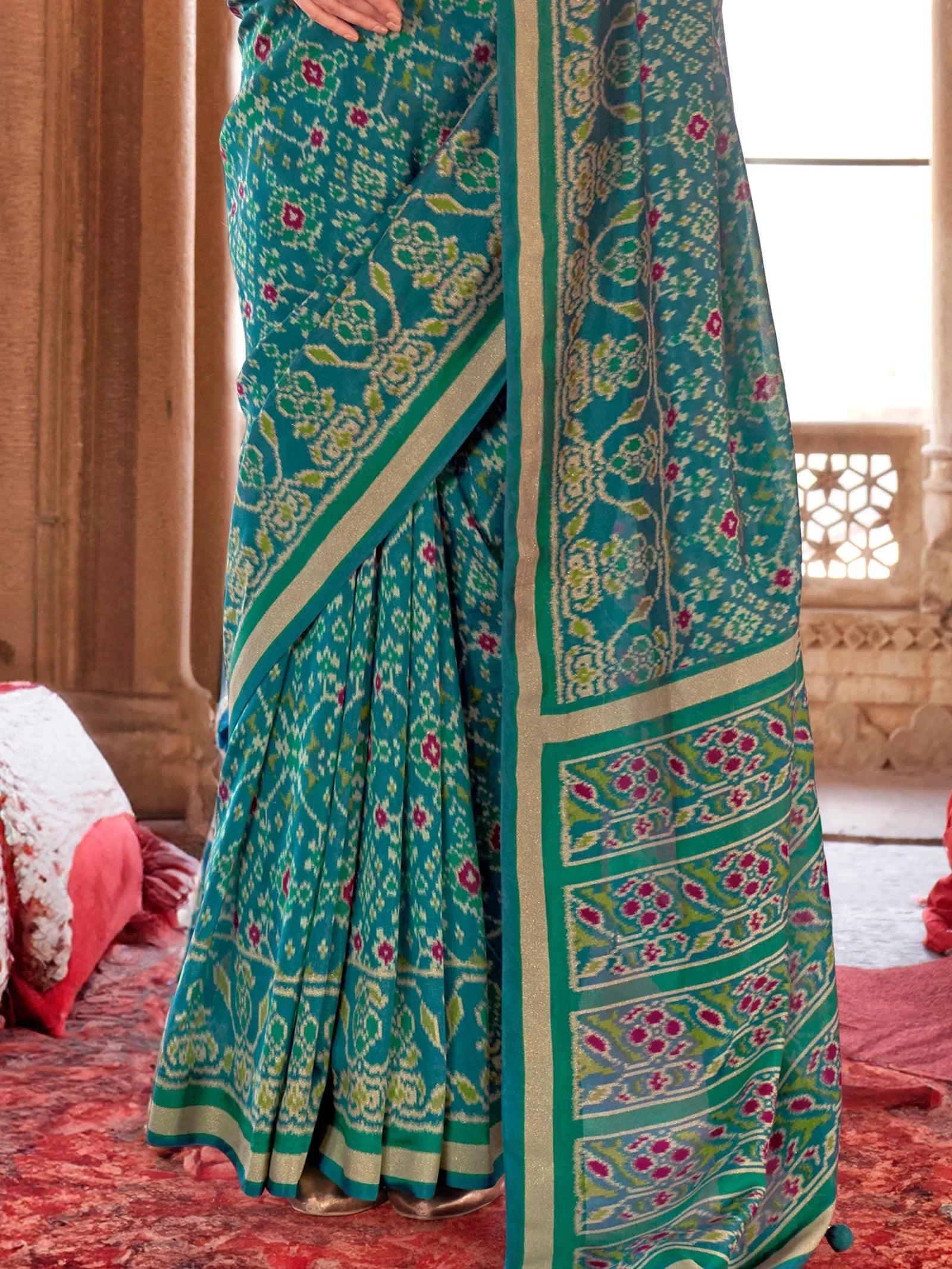 Enchanting Teal Green Patola Printed Georgette Casual Wear Saree